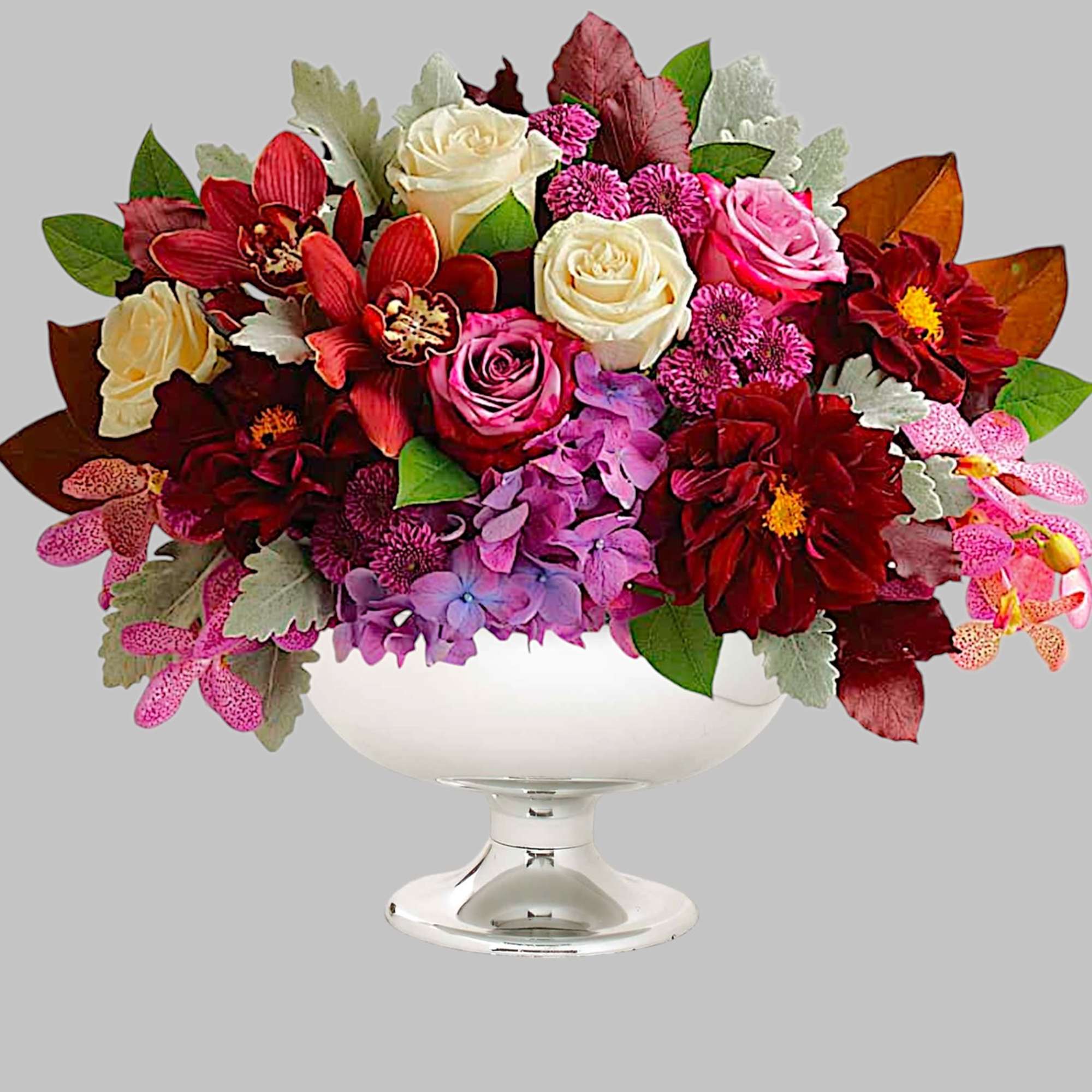 A chic spin on the traditional fall arrangement, this luxurious bouquet of