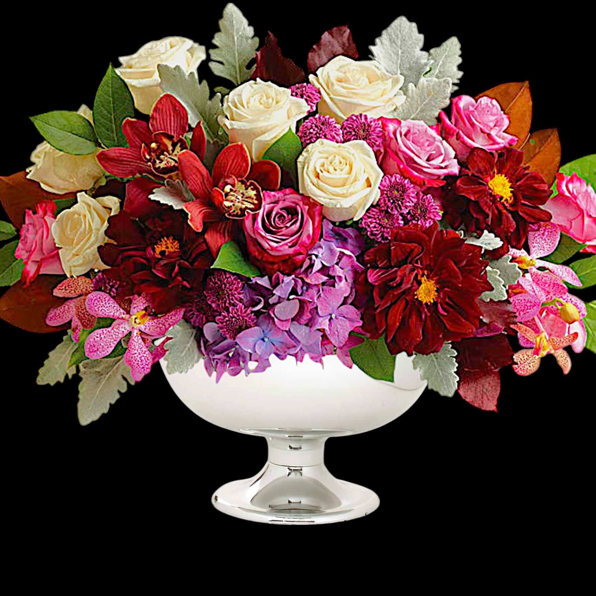 A chic spin on the traditional fall arrangement, this luxurious bouquet of