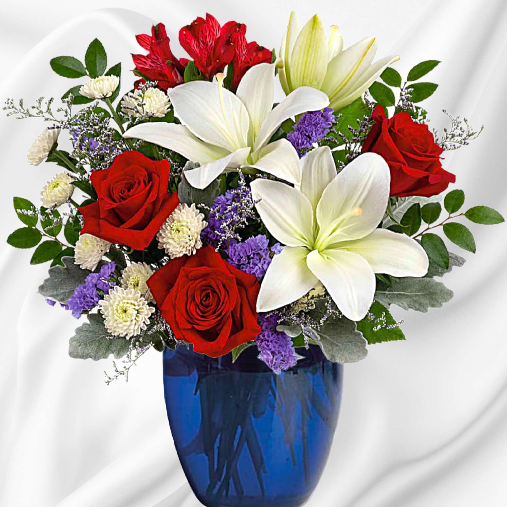 Revel in the crisp, classic color scheme of white lilies and radiant