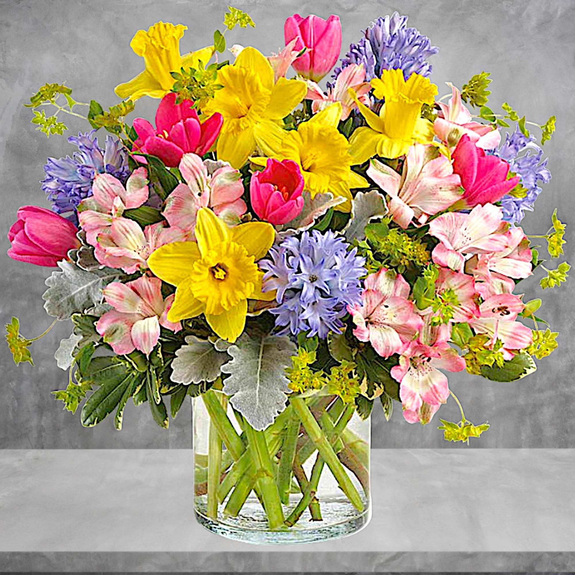 Celebrate the joy of the new season with this springtastic flower arrangement!