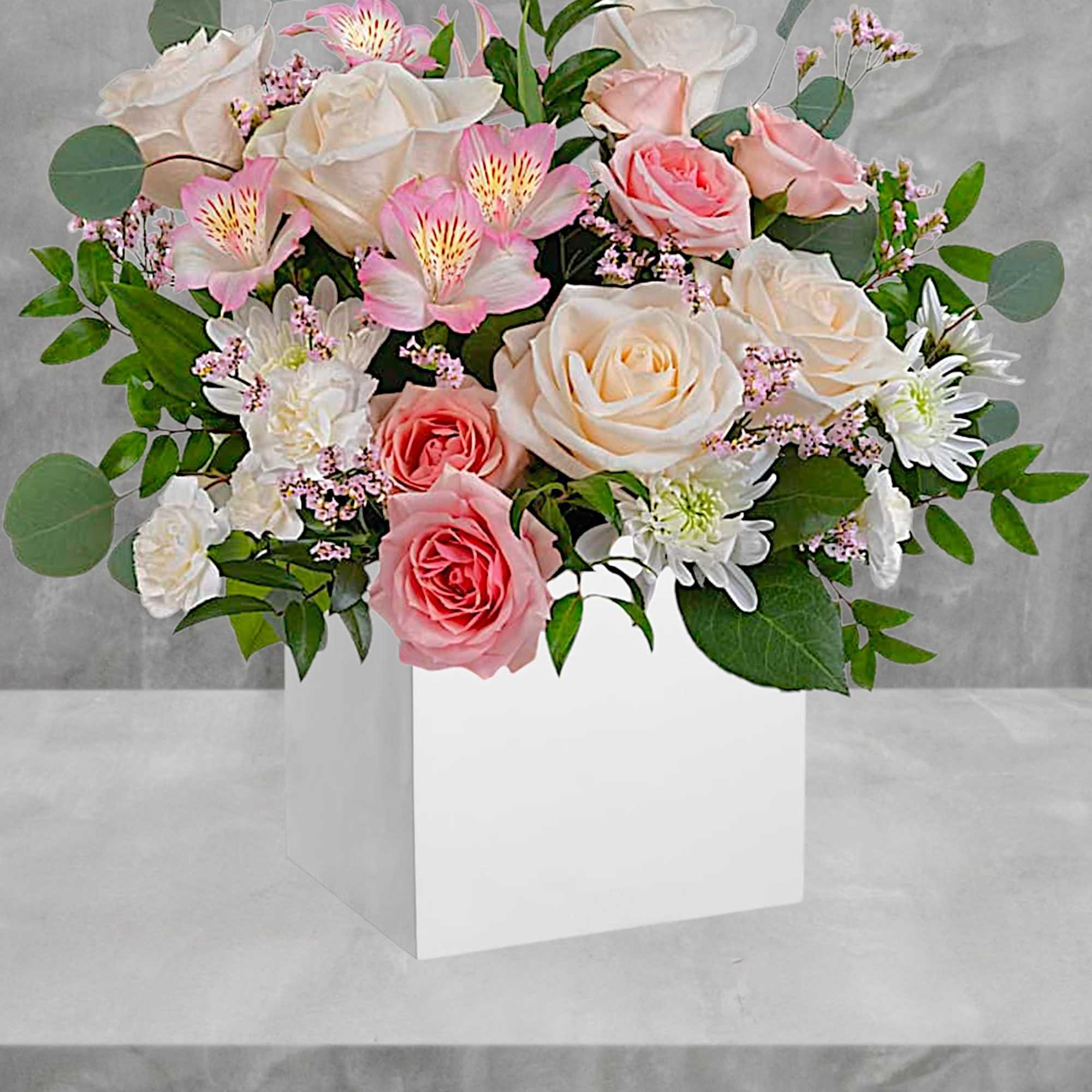 Gift timeless elegance with our vibrant pink and creme flower arrangement.

DETAILS
Cr&egrave;me roses