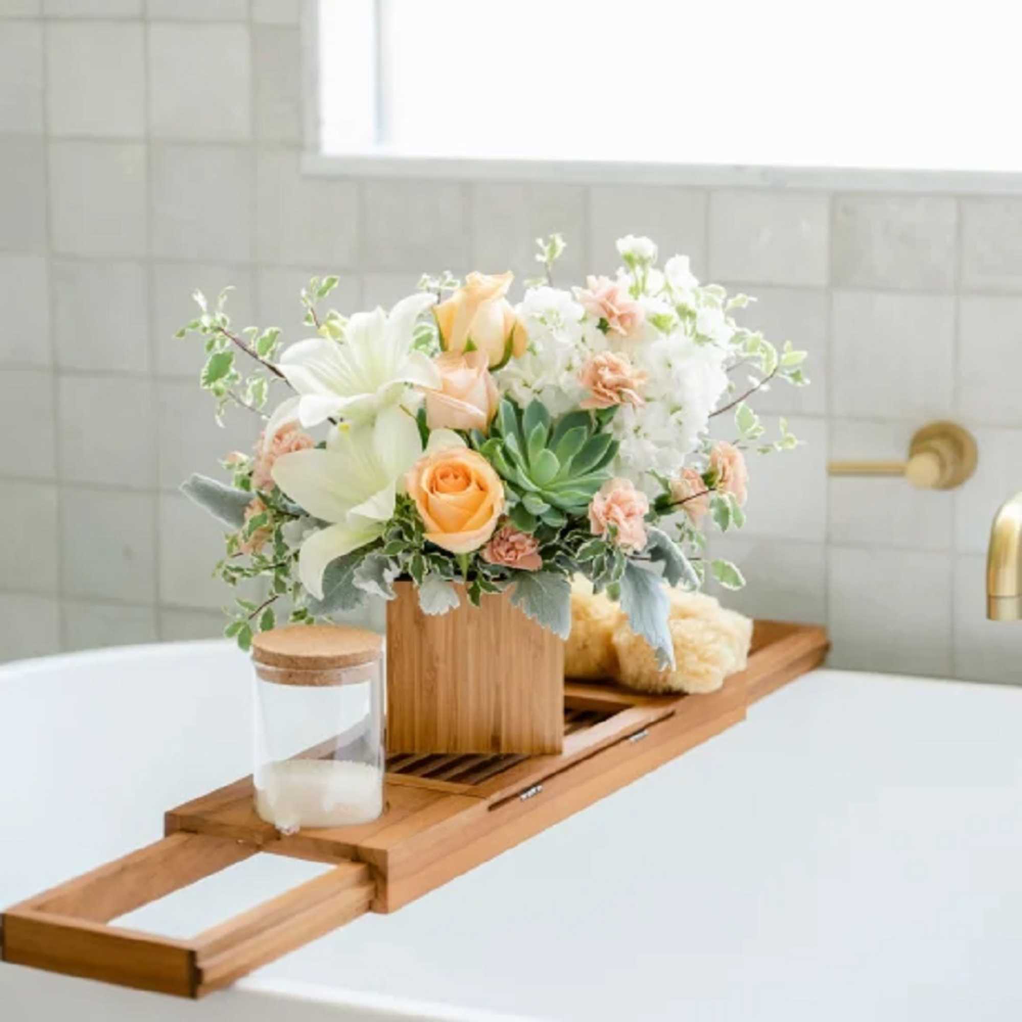 Reminiscent of a desert sunrise, this modern mix of peach blooms, white