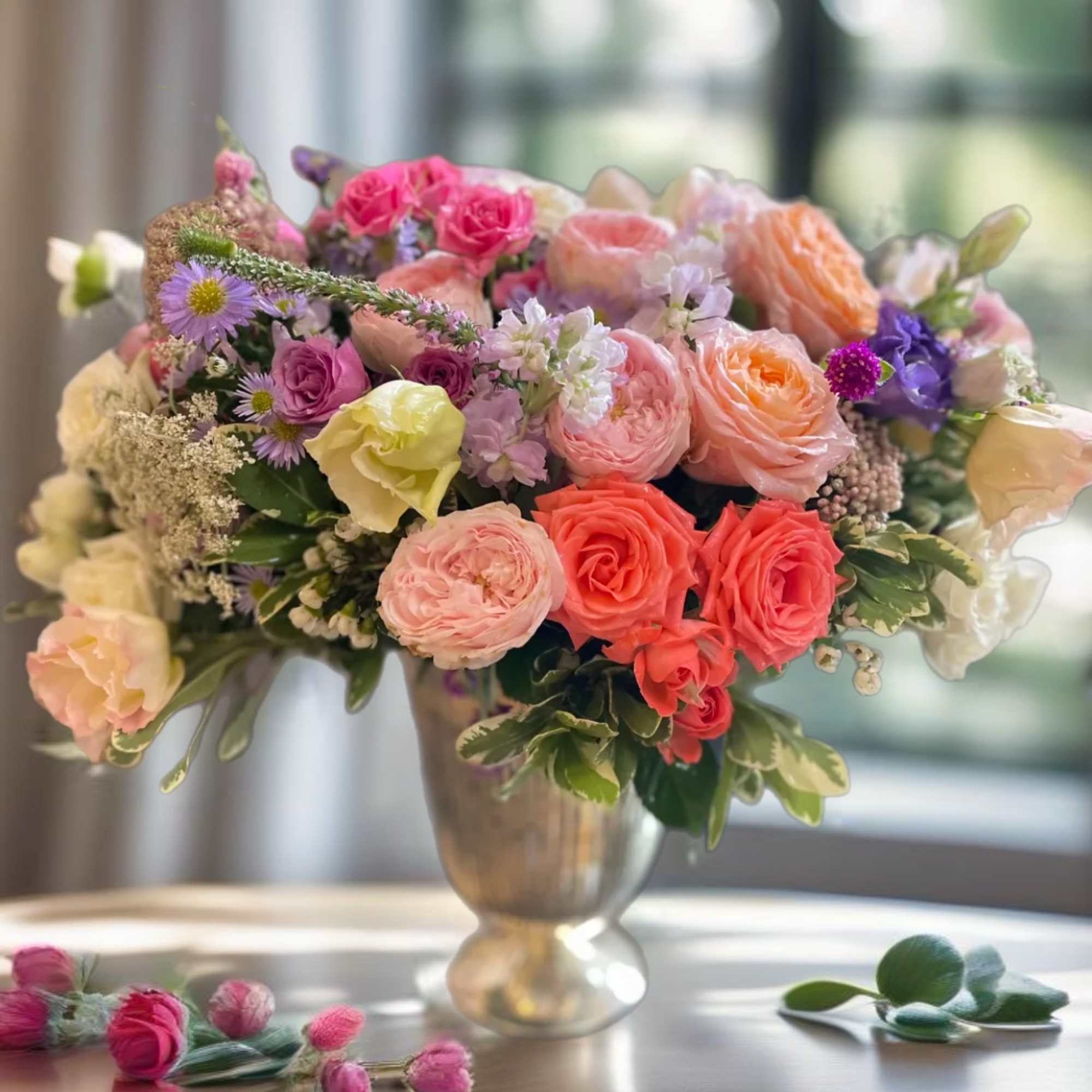 Freshly arranged garden roses in the stunning silver tall vase. Beautiful gift