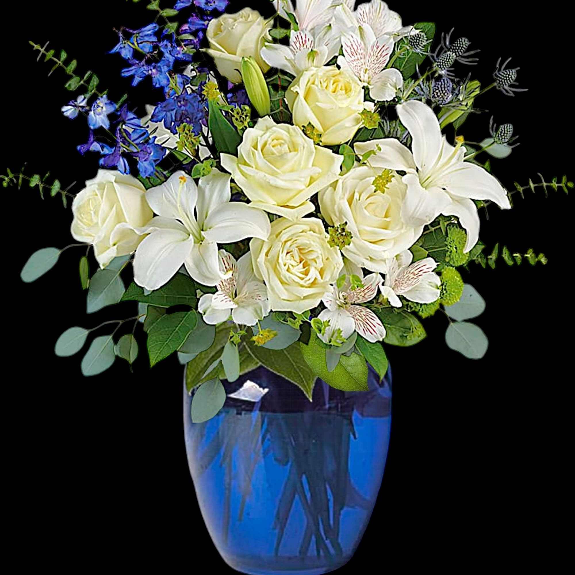 With its deep cobalt glass vase and white blooms, this soothing bouquet