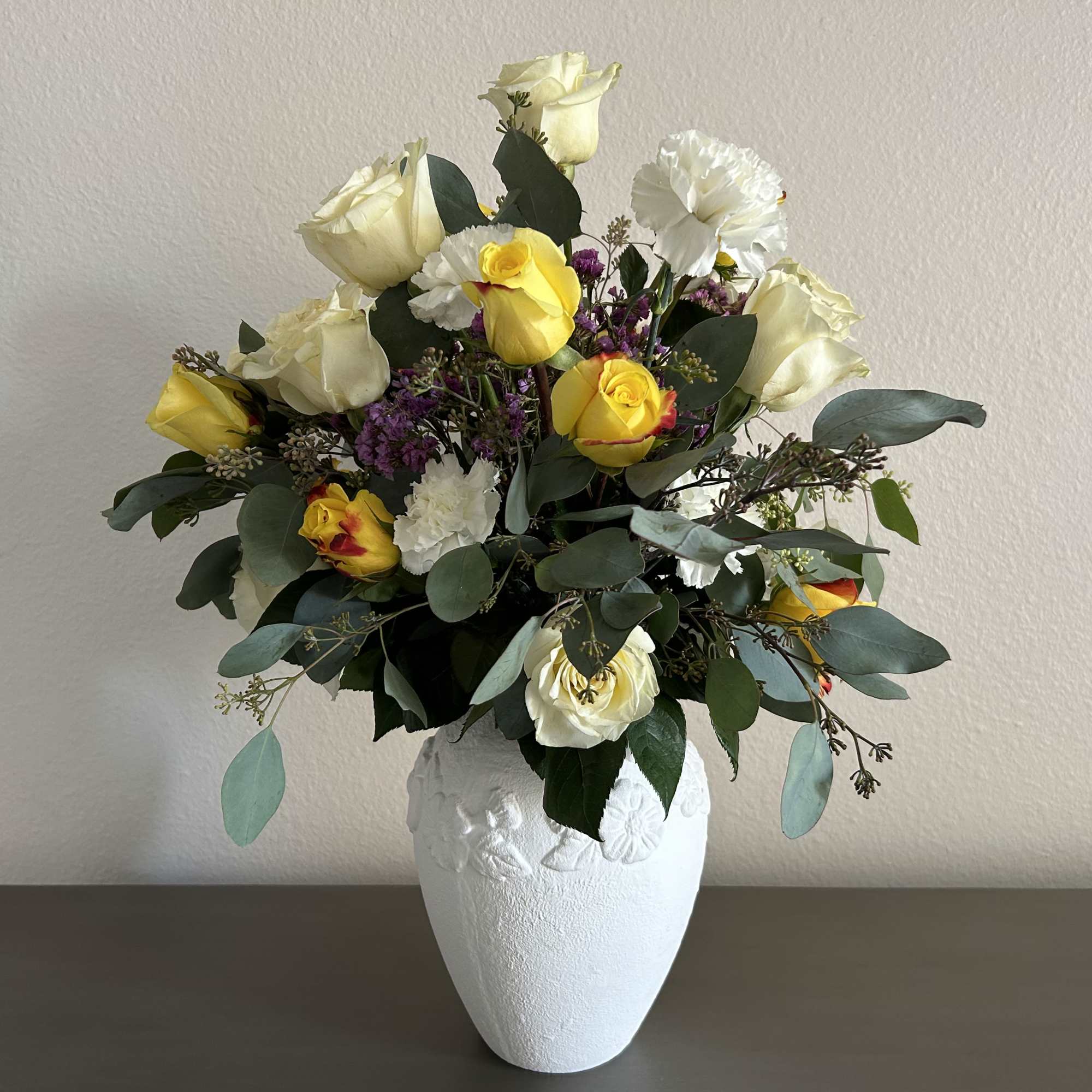 Offer a gentle touch of solace with Tranquil Reflections, a sympathy flower