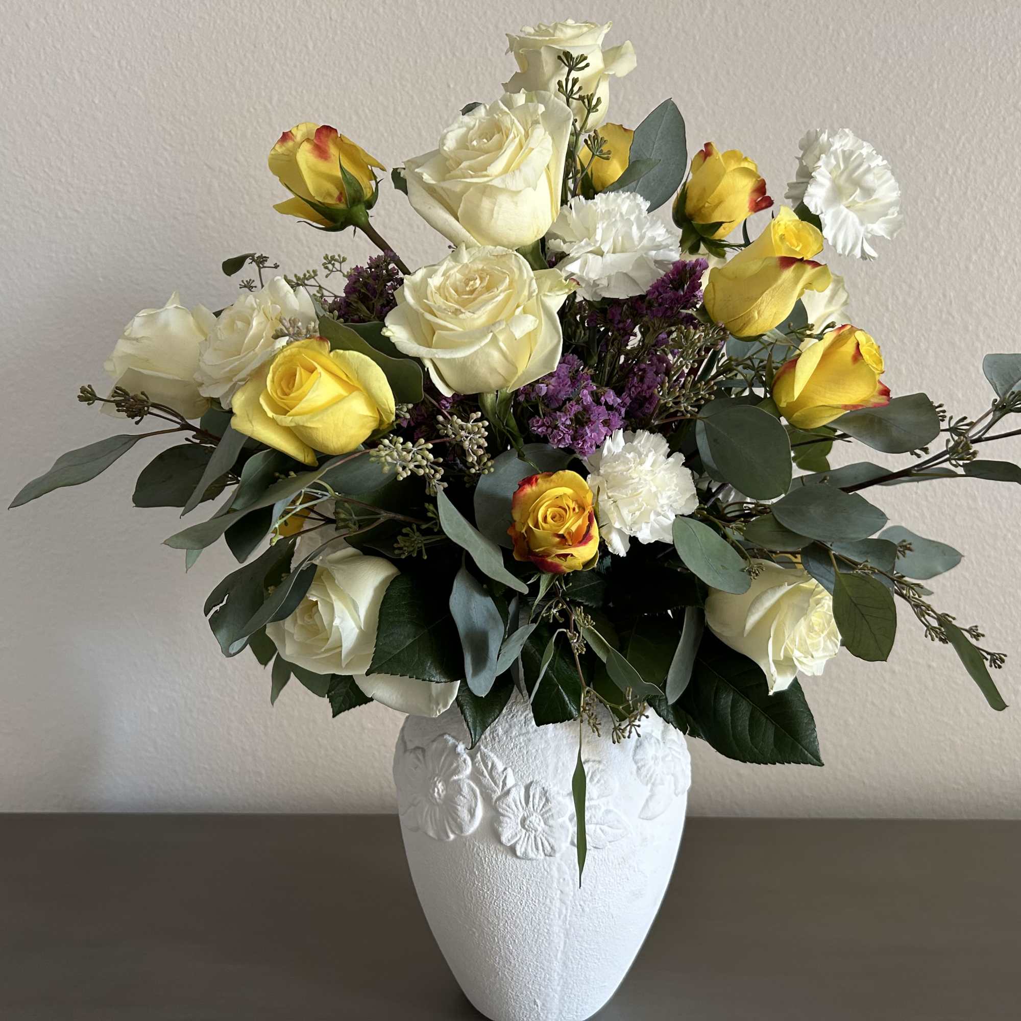 Offer a gentle touch of solace with Tranquil Reflections, a sympathy flower