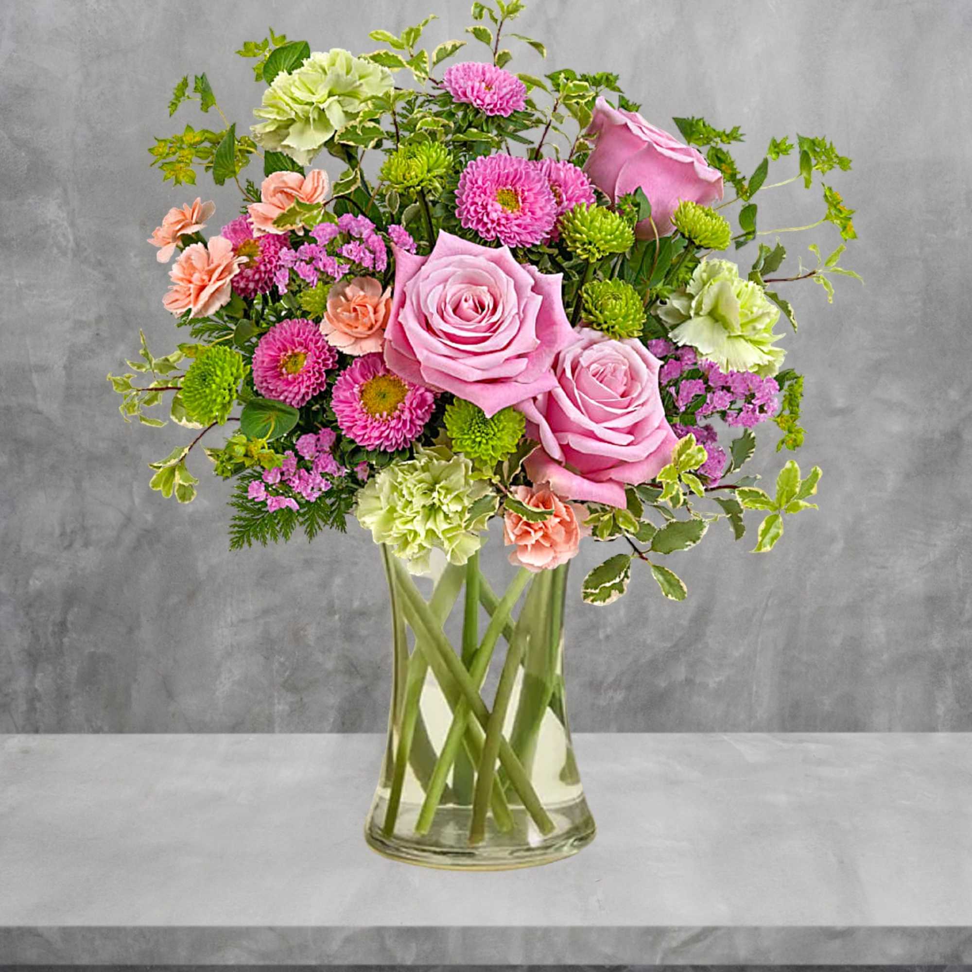Send this Charming Flower Arrangement to someone special. They will feel extra