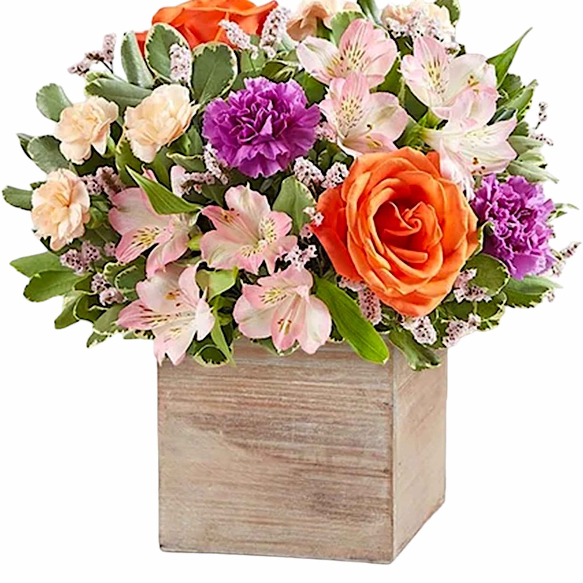 Chic meets sweet. This beautiful arrangement flaunts fresh spring style, gathered with