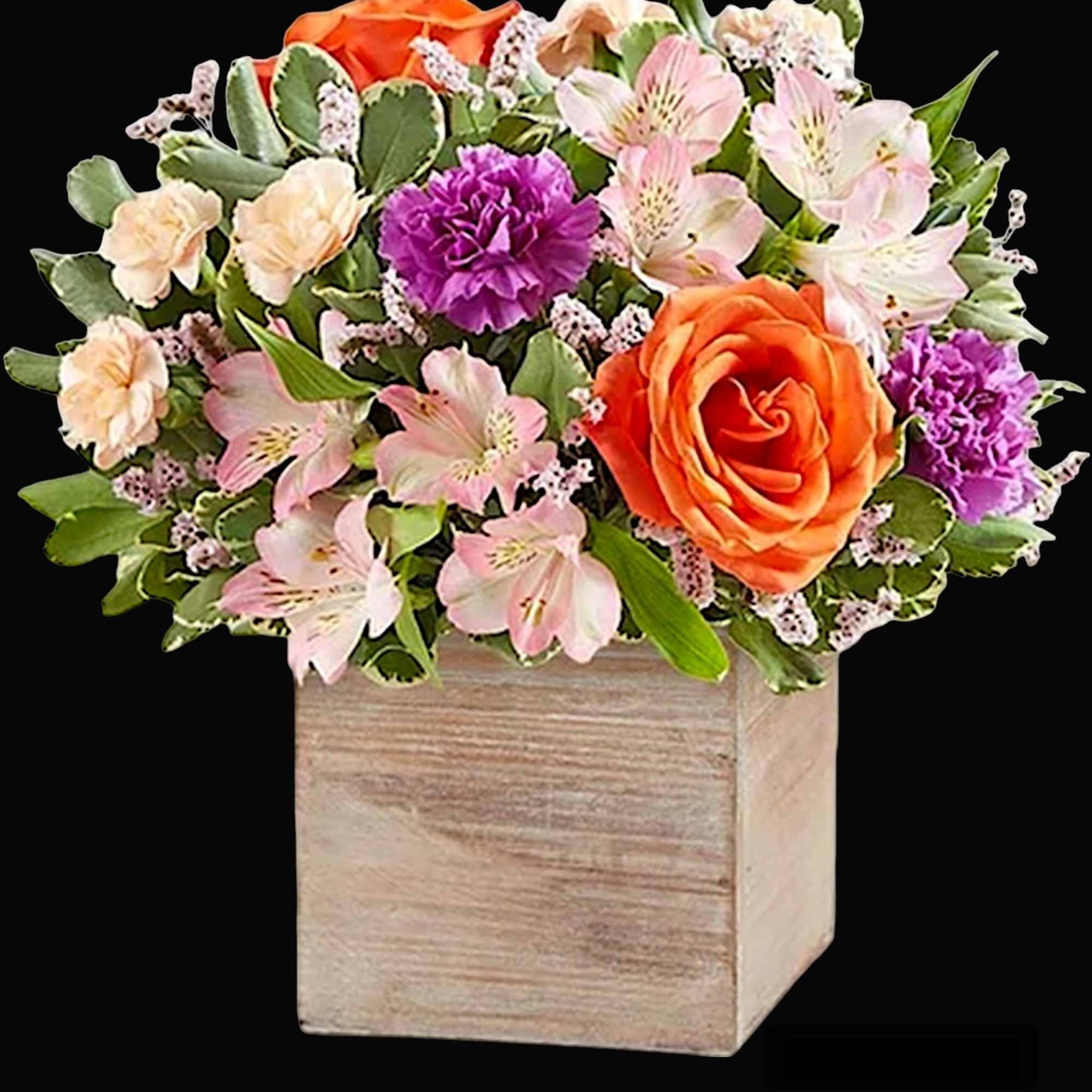 Chic meets sweet. This beautiful arrangement flaunts fresh spring style, gathered with