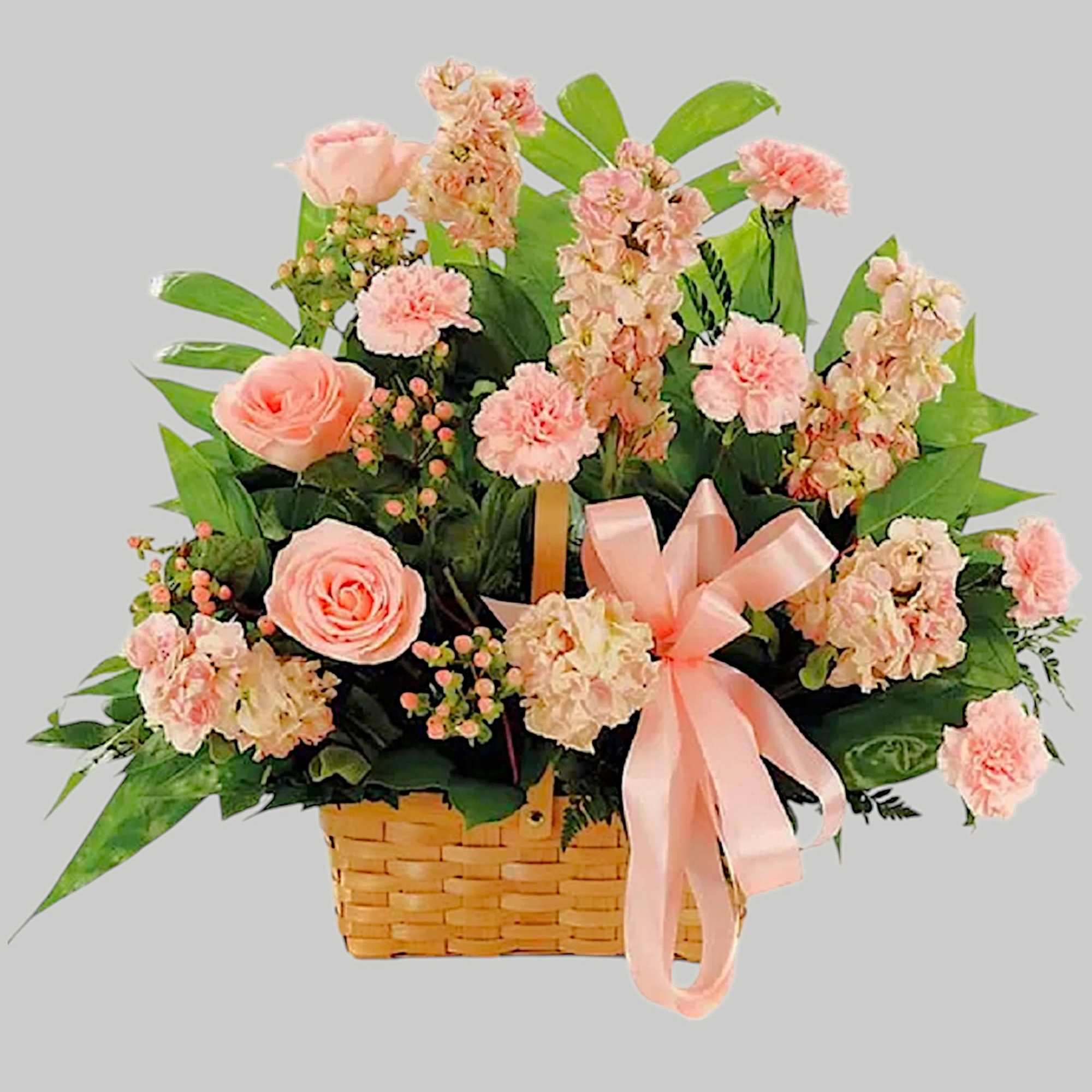 This classic peach fresh flower basket arrangement is a lovely way to