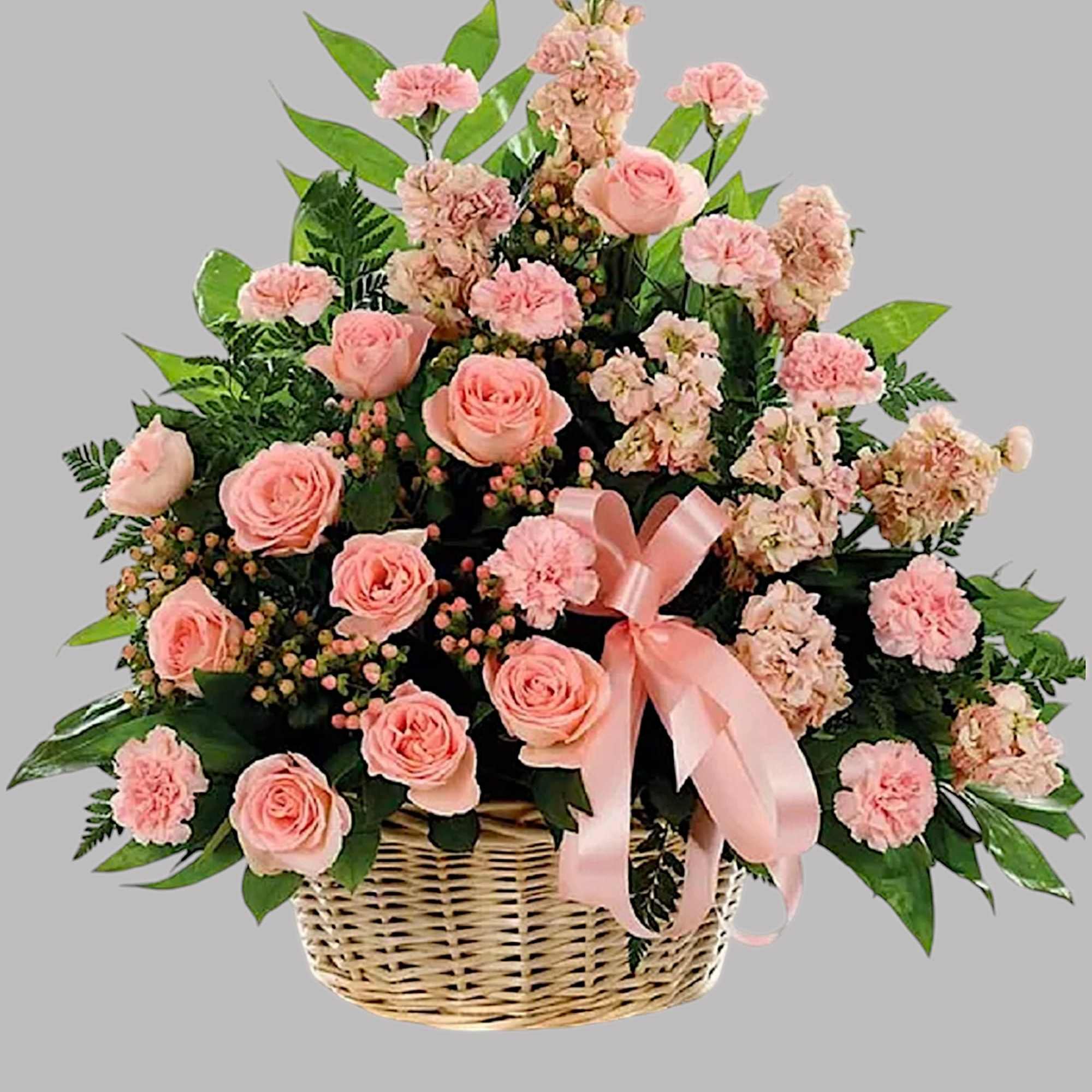 This classic peach fresh flower basket arrangement is a lovely way to