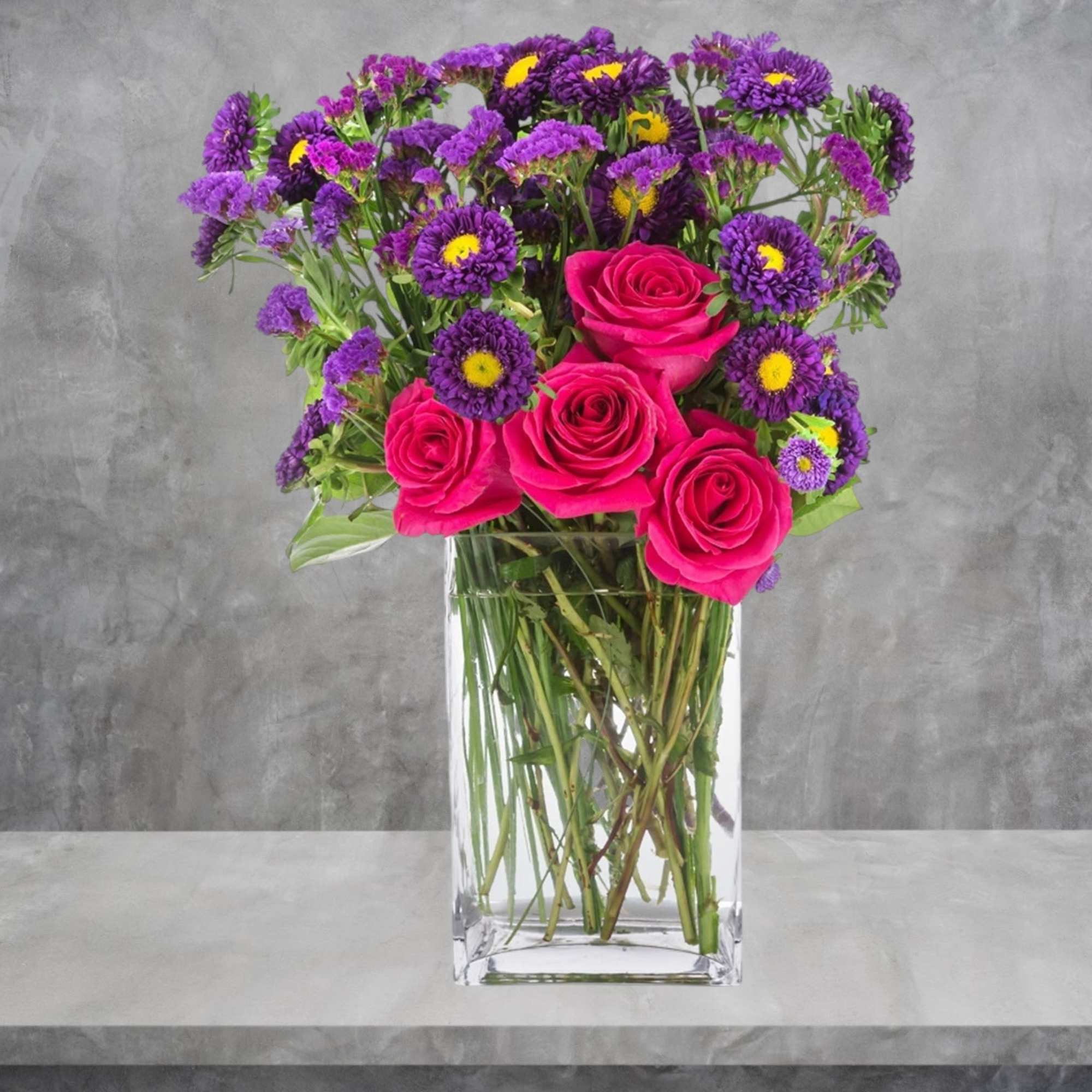 This pink and purple arrangement is tough! A good option to send