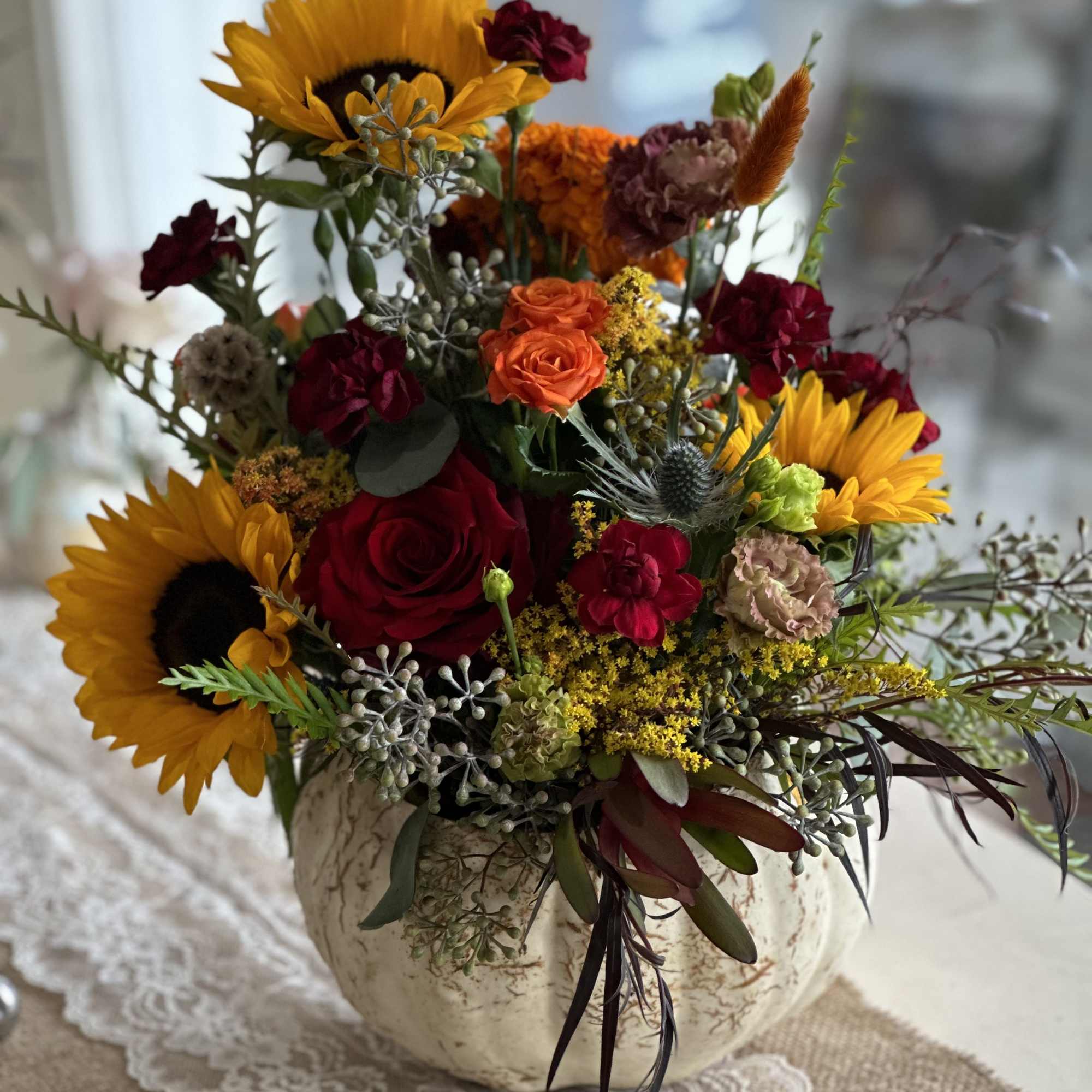 Elevate your Thanksgiving table this Holiday with our exquisite flower arrangements meticulously