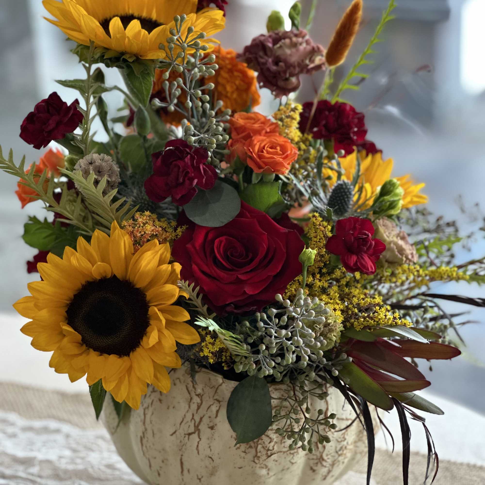 Elevate your Thanksgiving table this Holiday with our exquisite flower arrangements meticulously