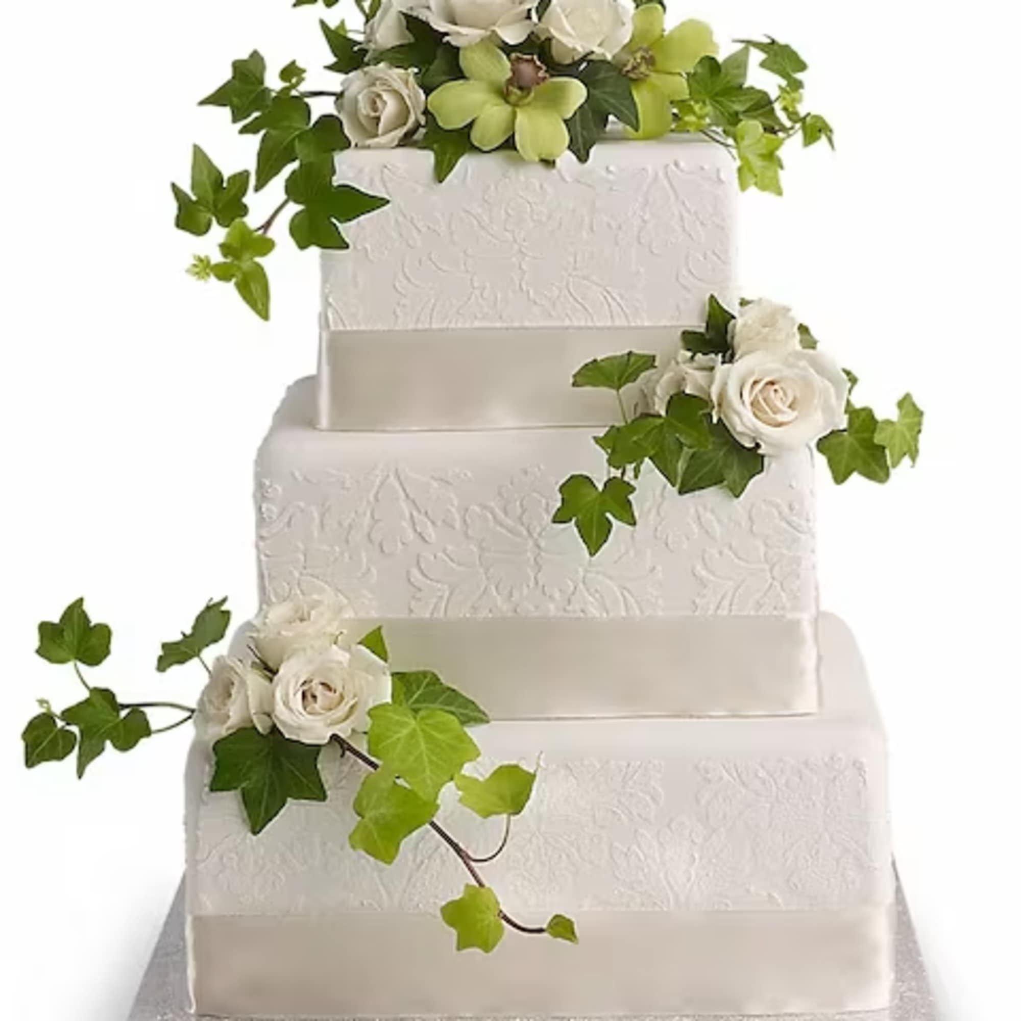 A classic combo of cloud-white roses and fresh green ivy.
White spray roses