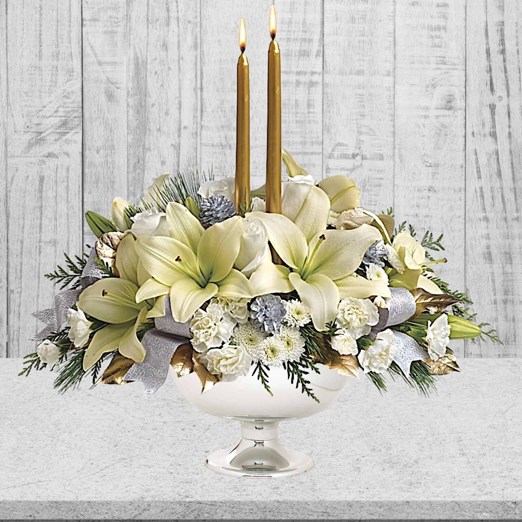 Celebrate the season with this majestic centerpiece of sparkling silver and glamorous