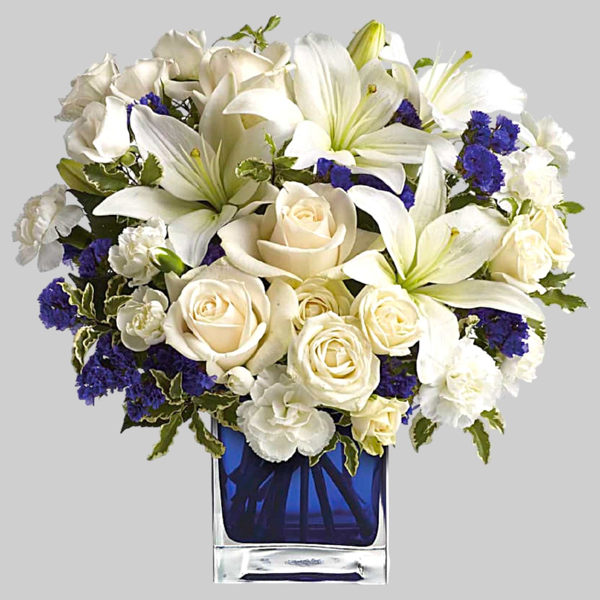 Like gazing into a clear blue sky, this serene arrangement soothes the