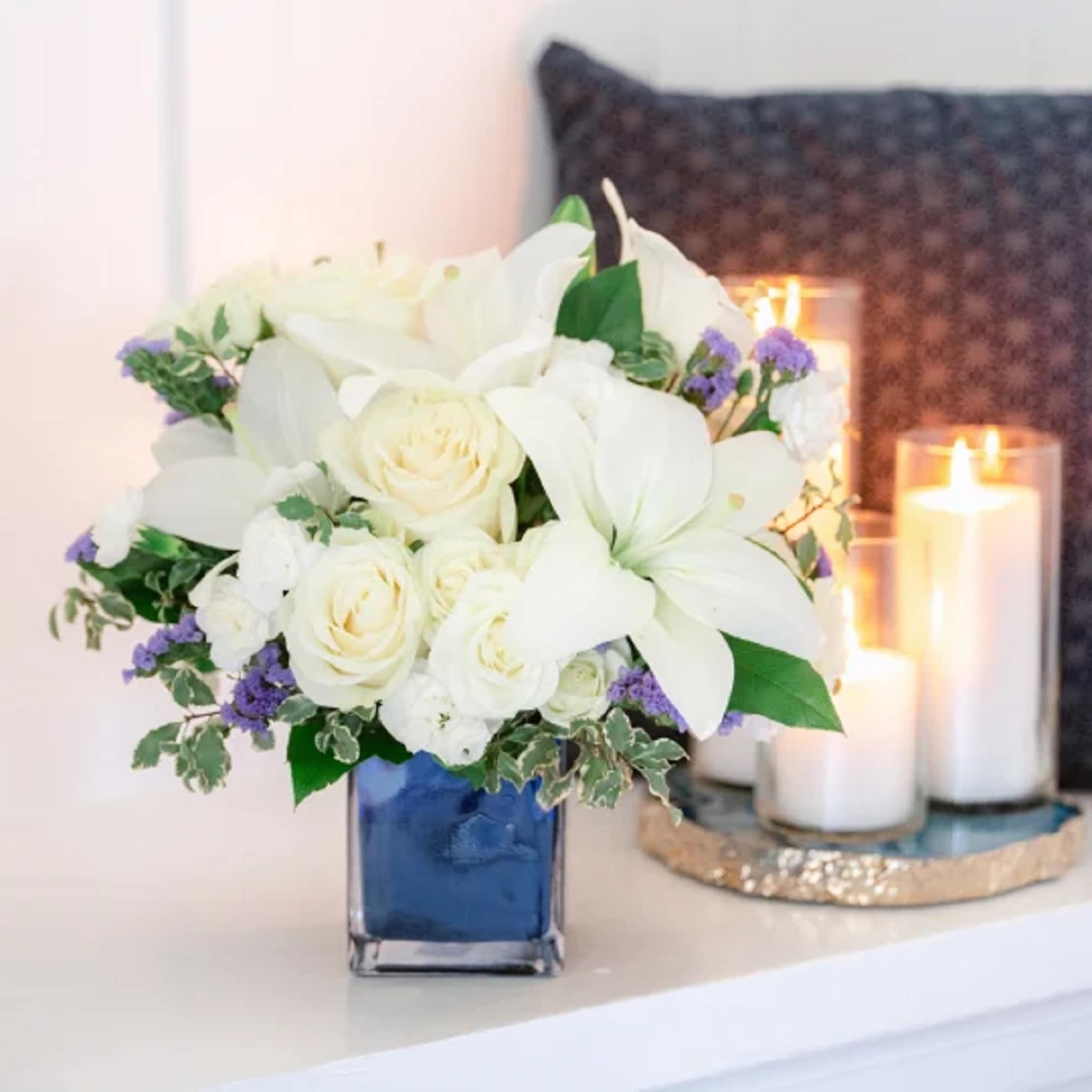 Like gazing into a clear blue sky, this serene arrangement soothes the