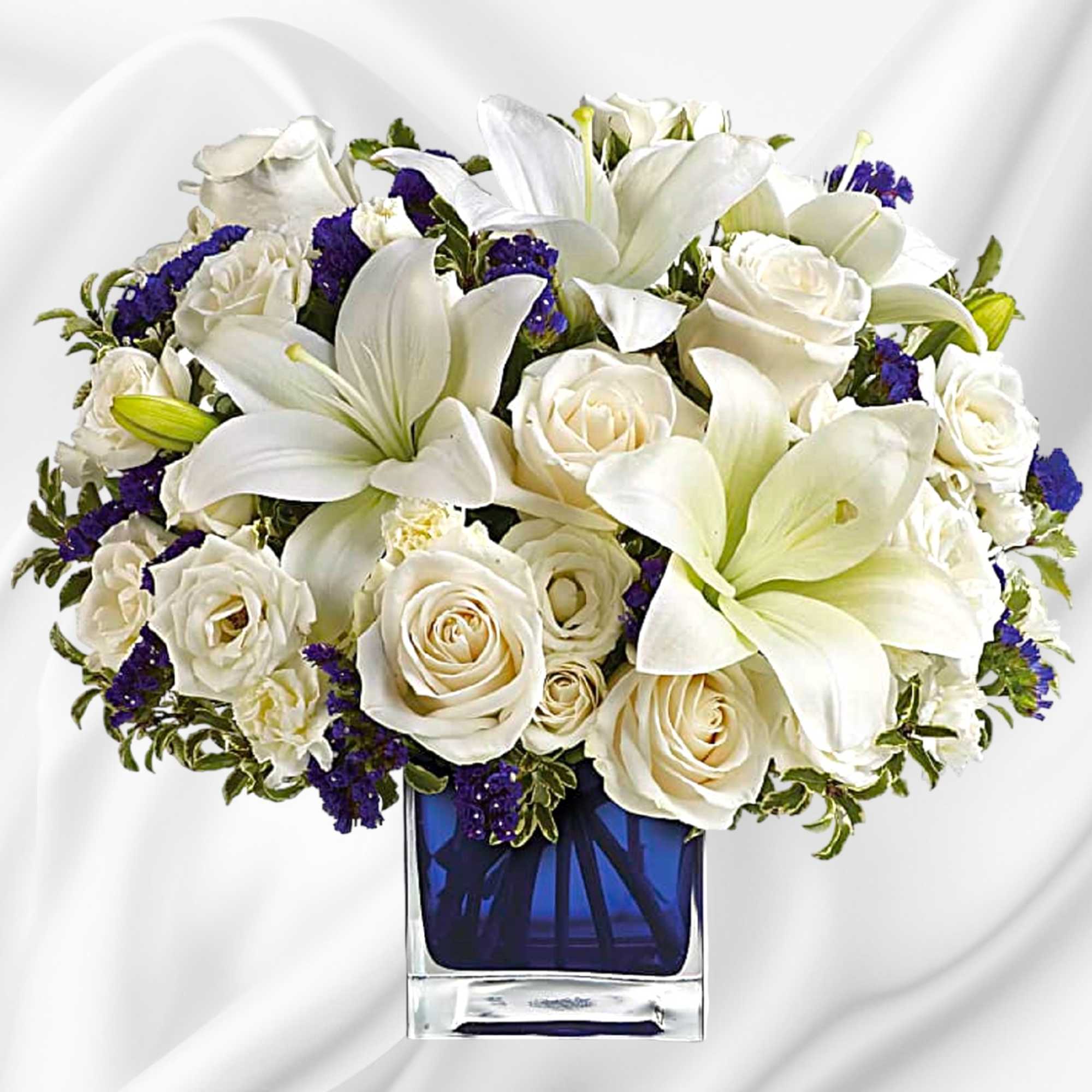 Like gazing into a clear blue sky, this serene arrangement soothes the