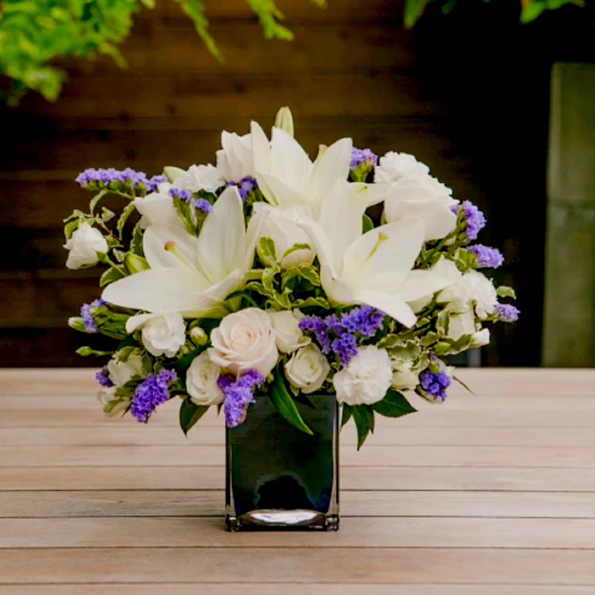 Like gazing into a clear blue sky, this serene arrangement soothes the