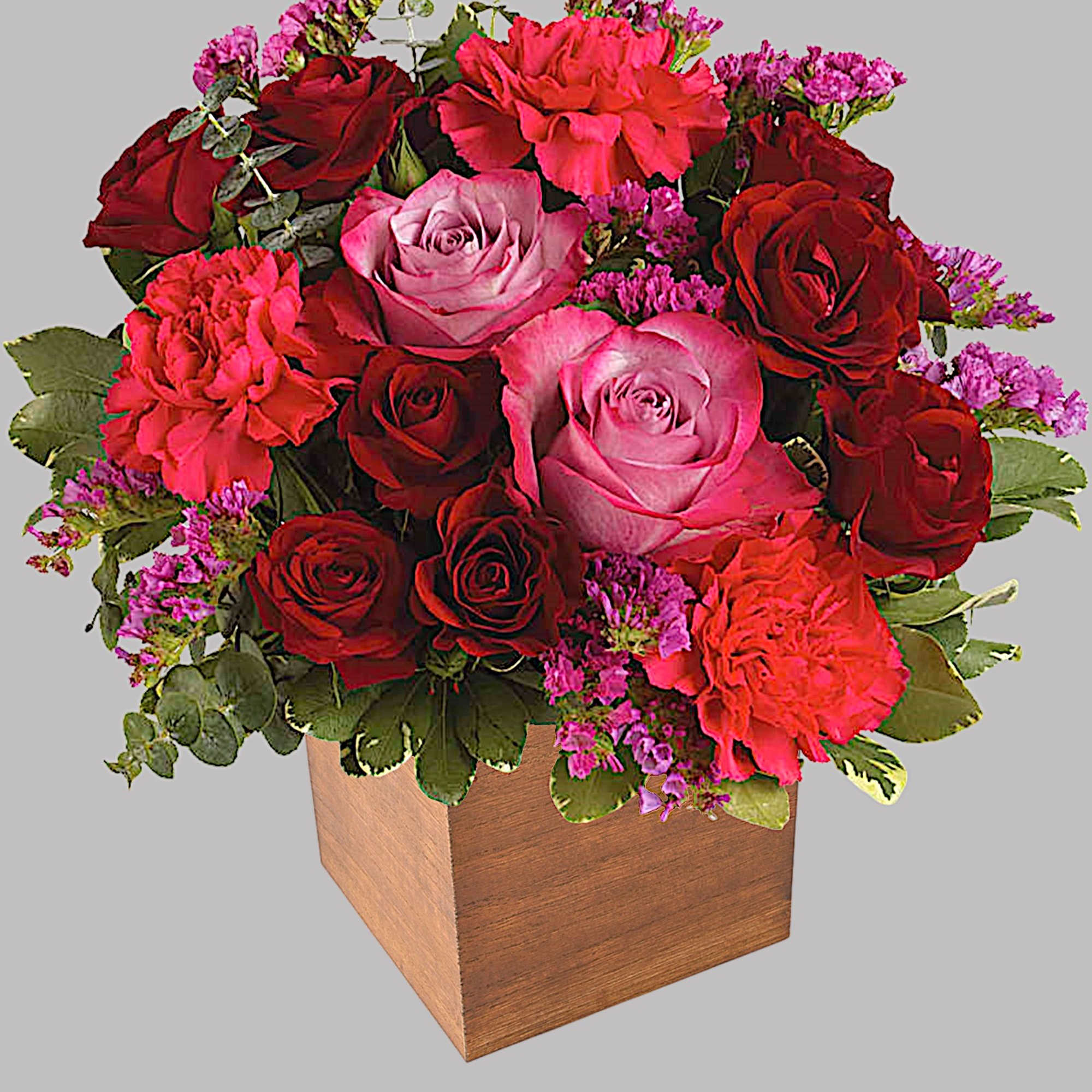 Pure passion. Bedazzle your beloved with luscious red and lavender roses in