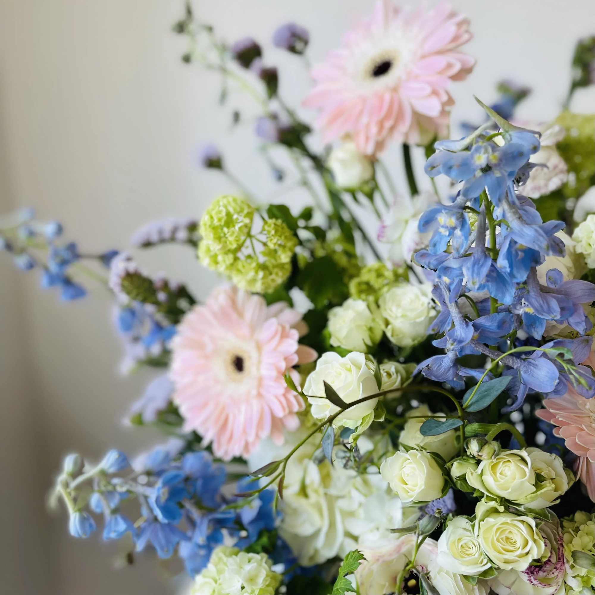 Indulge in the timeless elegance of our exquisite floral arrangement, where the