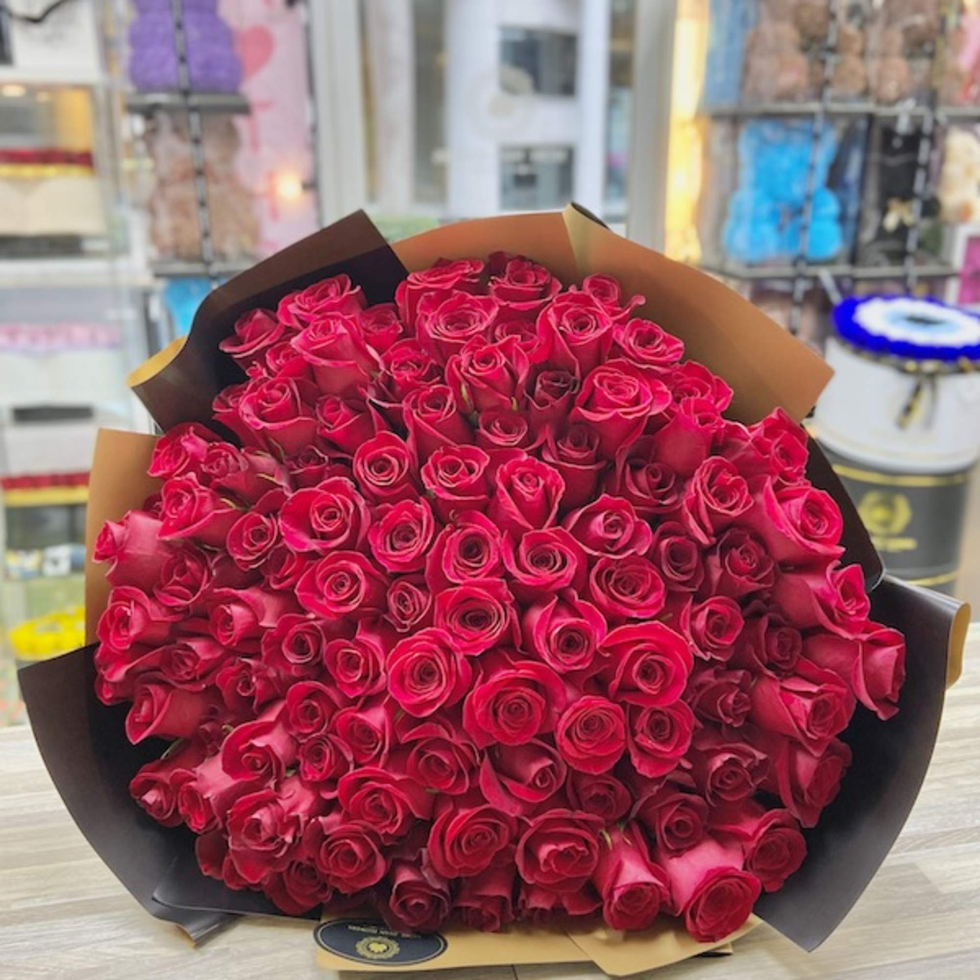 100 Roses Round Euro Bouquet: Fresh cut Roses with european style wrapping