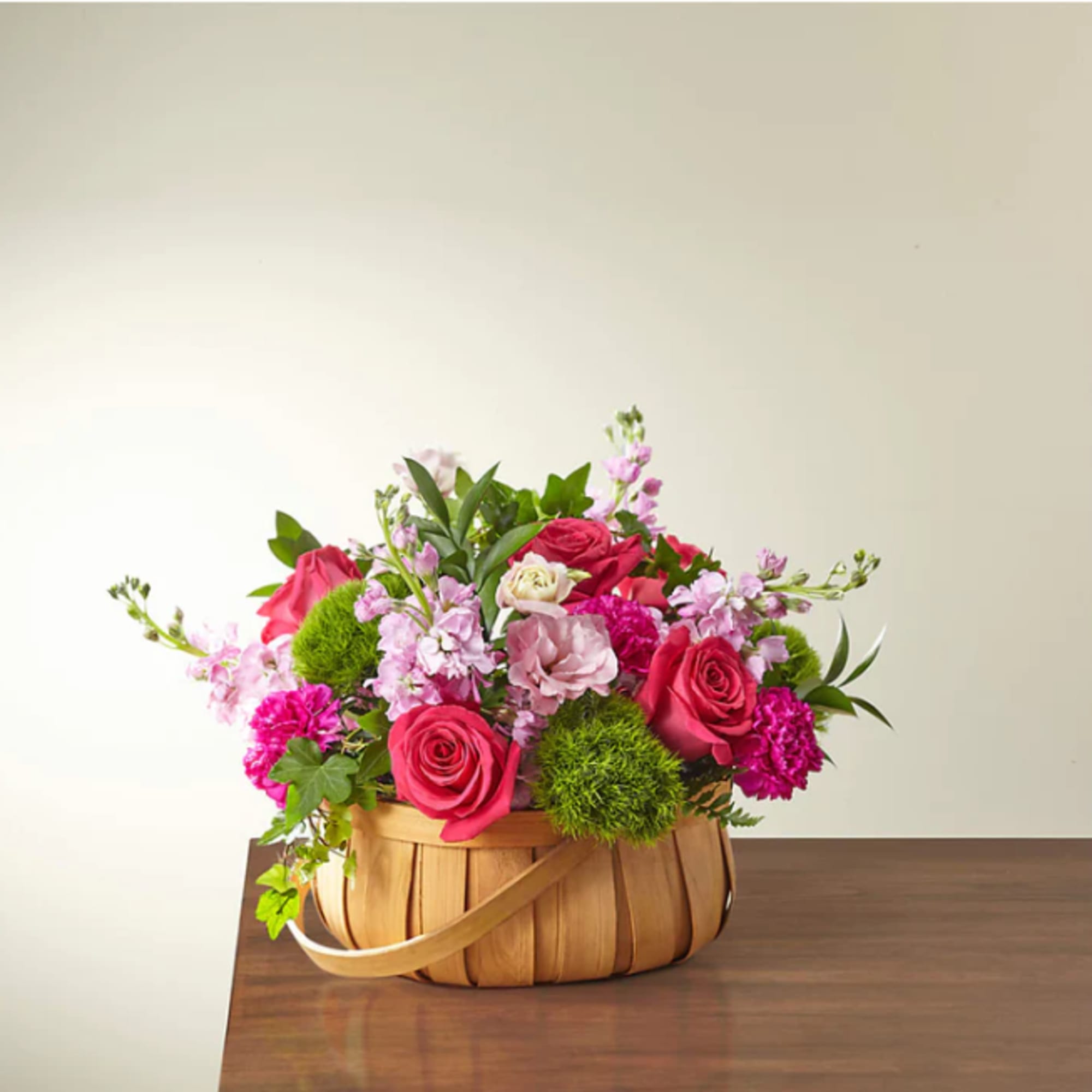 Inspired by bright shades and soft textures, this arrangement will wow your