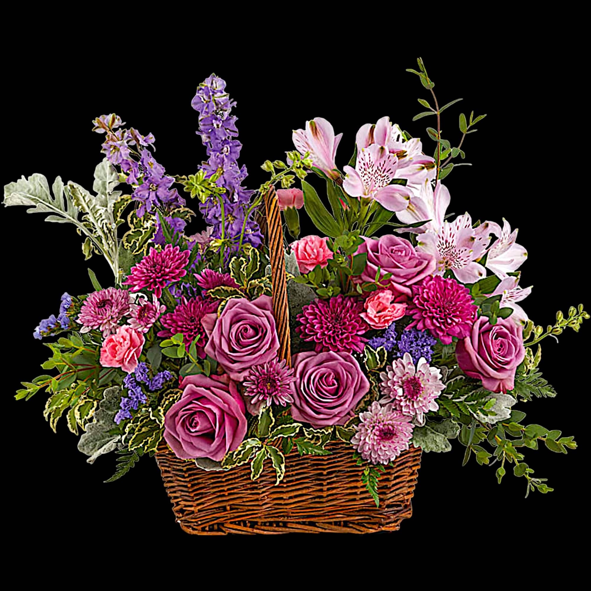 This lush lavender rose arrangement is a basket of beauty to brighten
