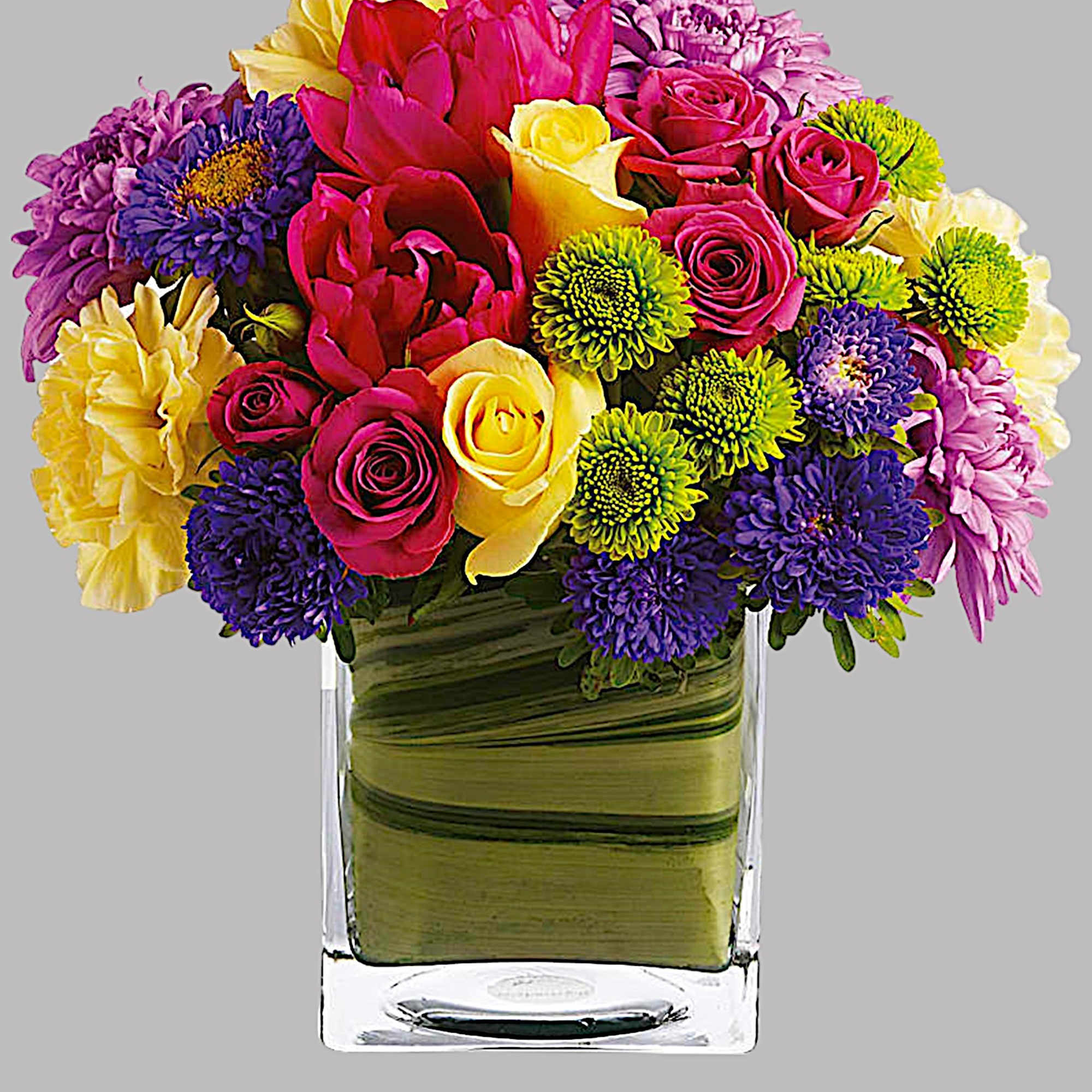 A chic, stylish twist on classic spring flowers! Creamy yellow roses pop