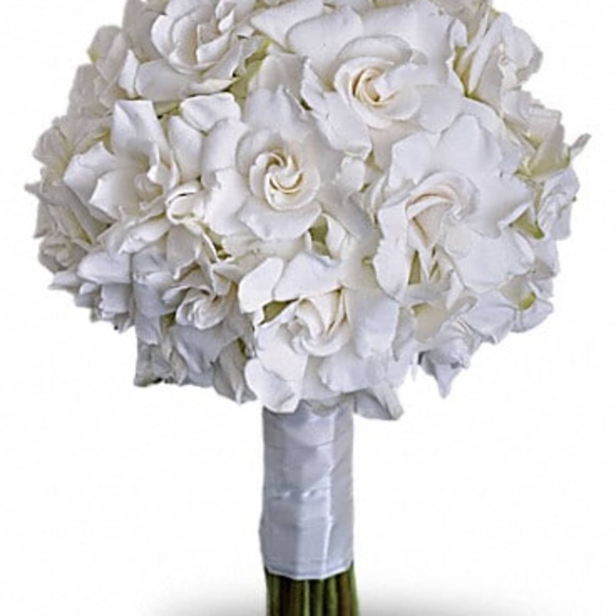 Beloved for their enchanting fragrance, gardenias are gathered with hydrangea and roses