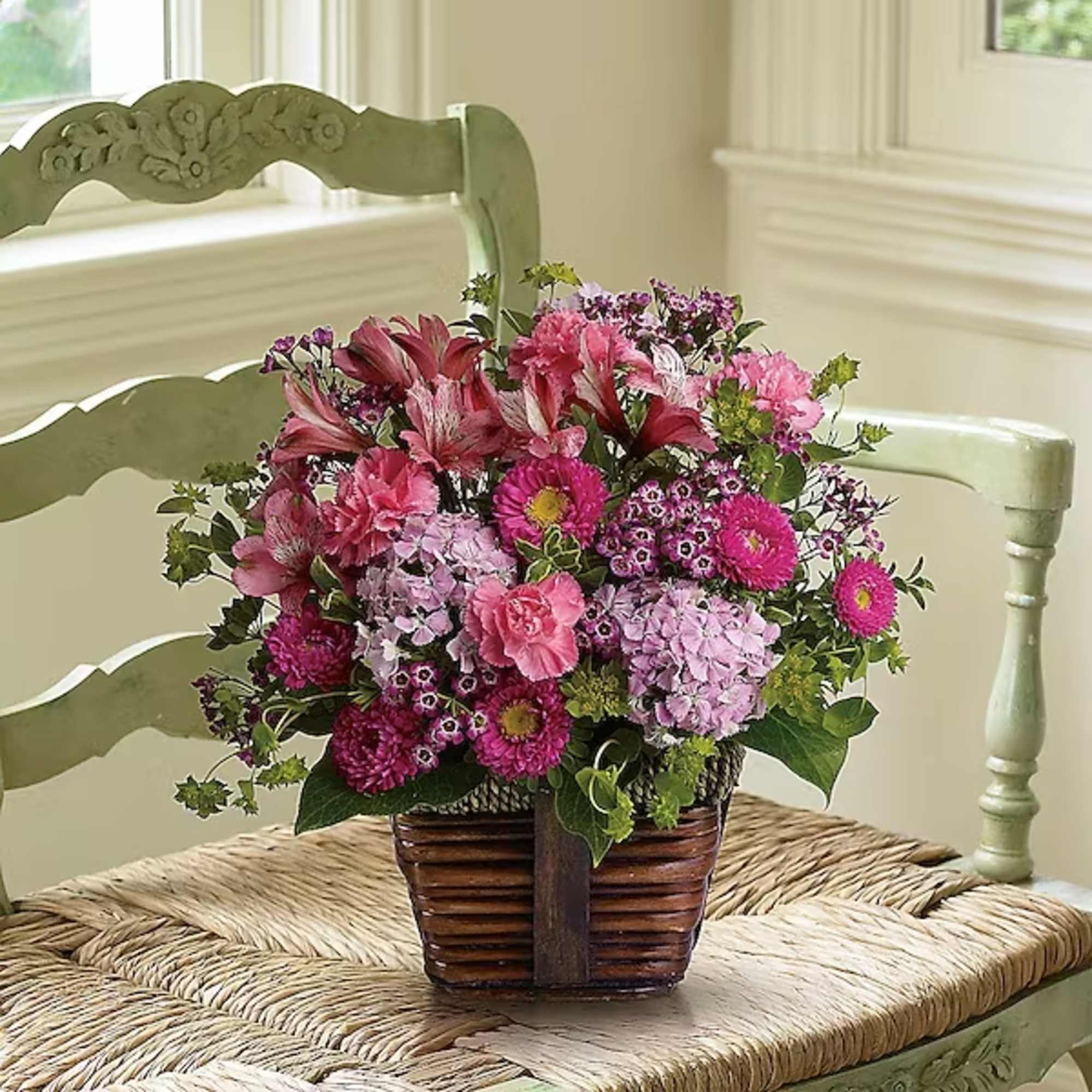 Send someone this delightful floral gift of pretty pink blossoms and share