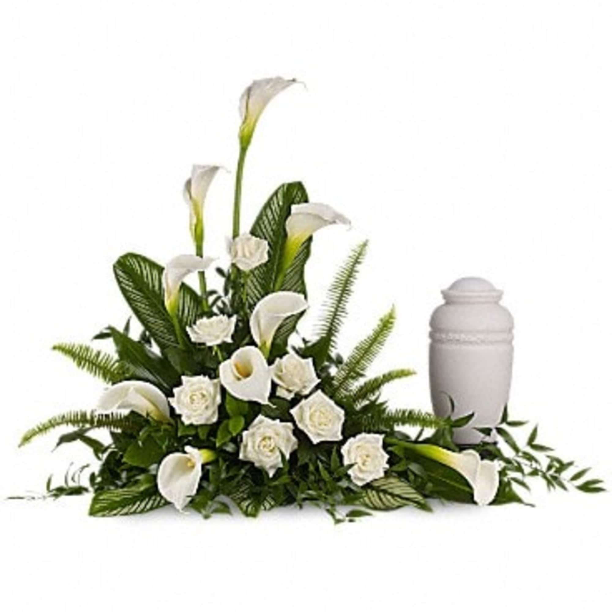 A calming portrait in ivory. Majestic calla lilies and stately white roses