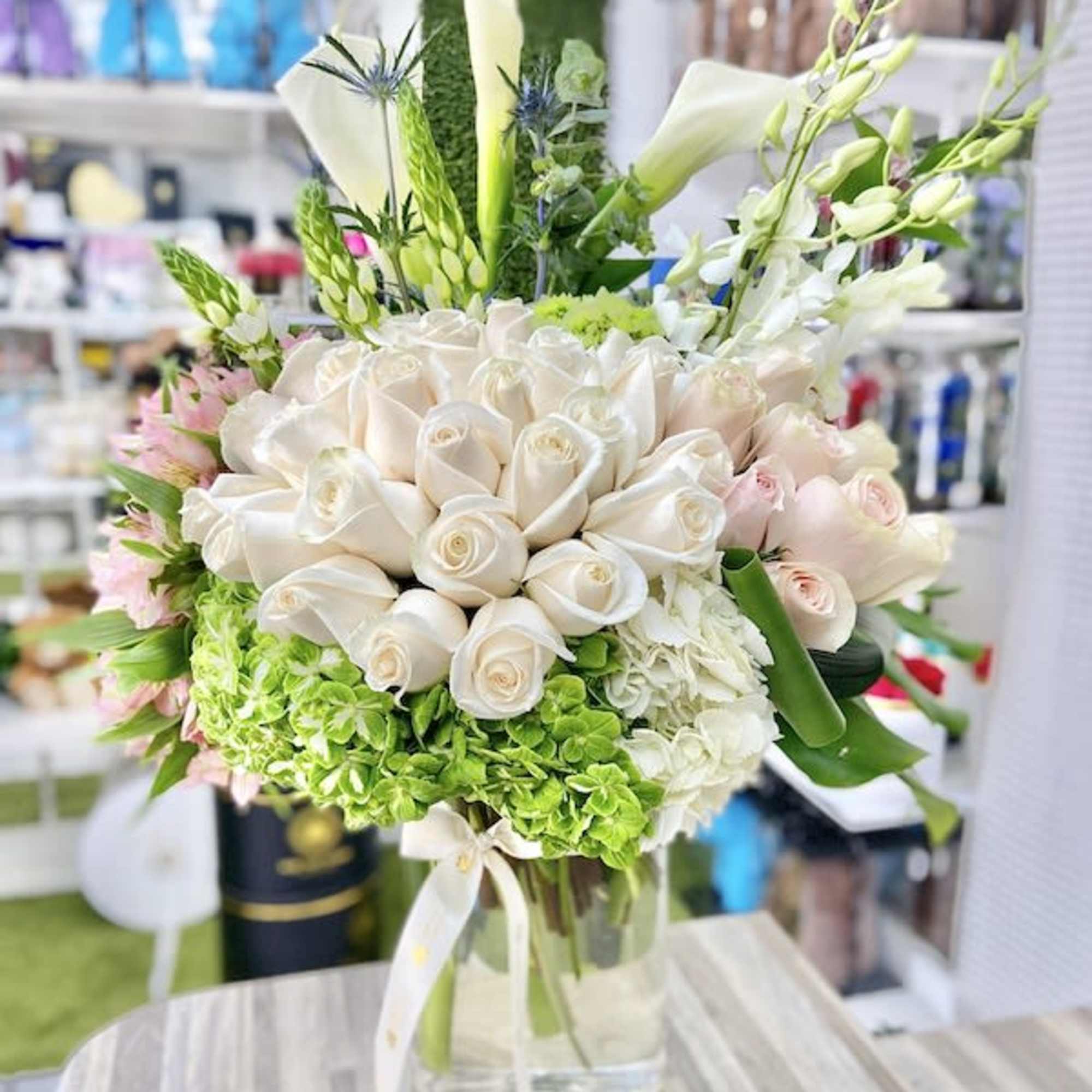 Amore Eterno Roses Bouquet: 3 doz. roses, hydrangeas, fillers, greens, and orchids