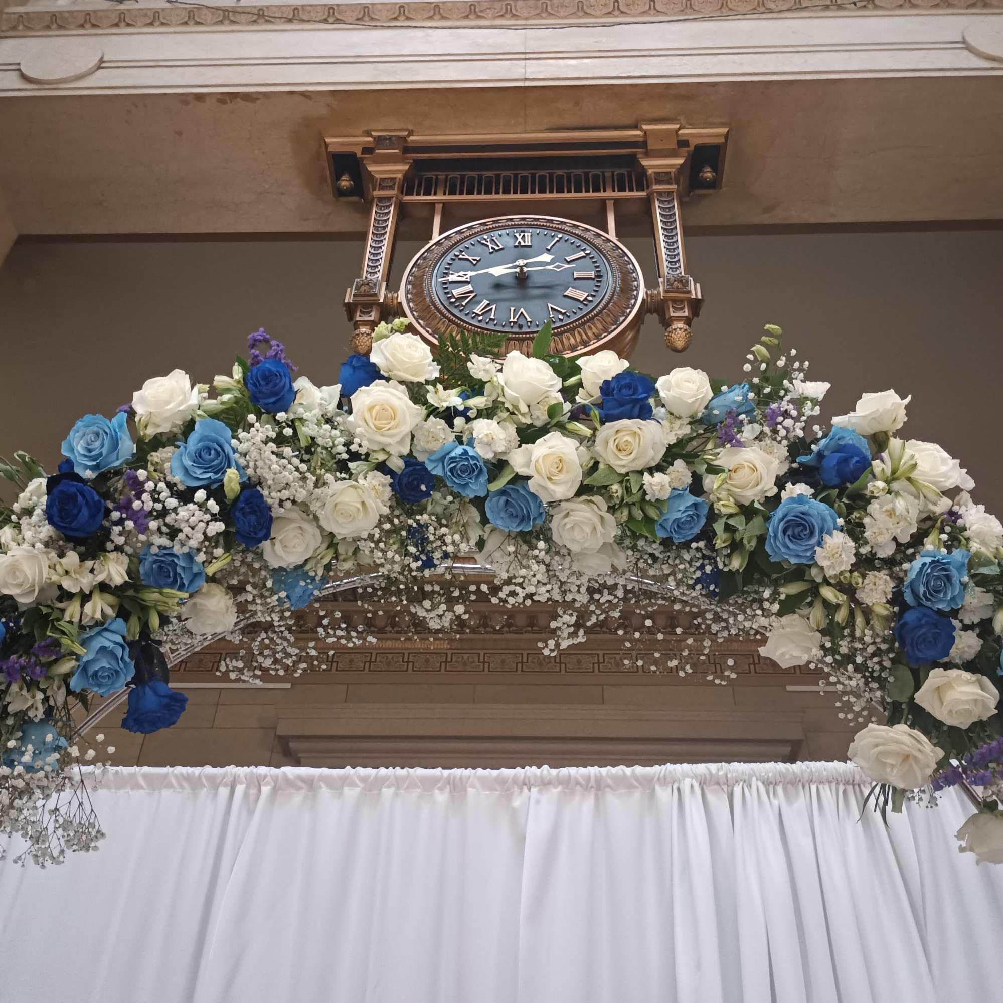 Beautiful mix of unusual light and dark blue roses, white roses, alstroemeria