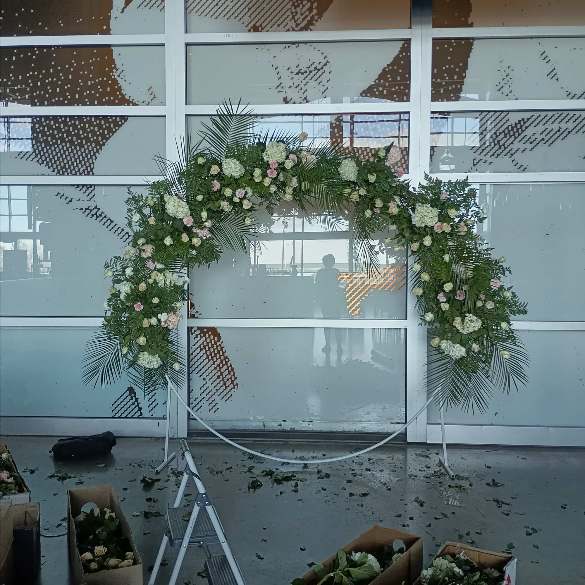 Beautiful half circle arch with white ad pink roses, carnations, hydrangea ad