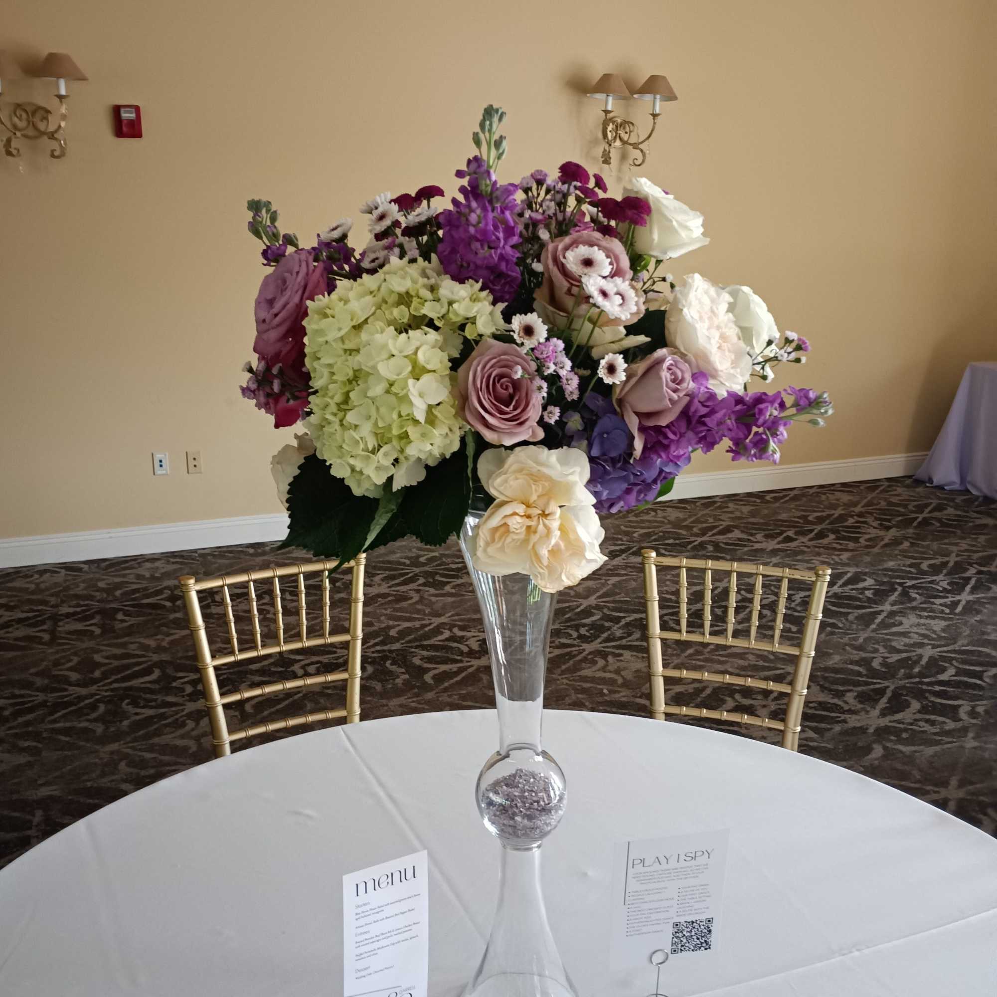 Beautiful shades of Lavander, purple, burgundy and white roses, hydrangeas, daisies and