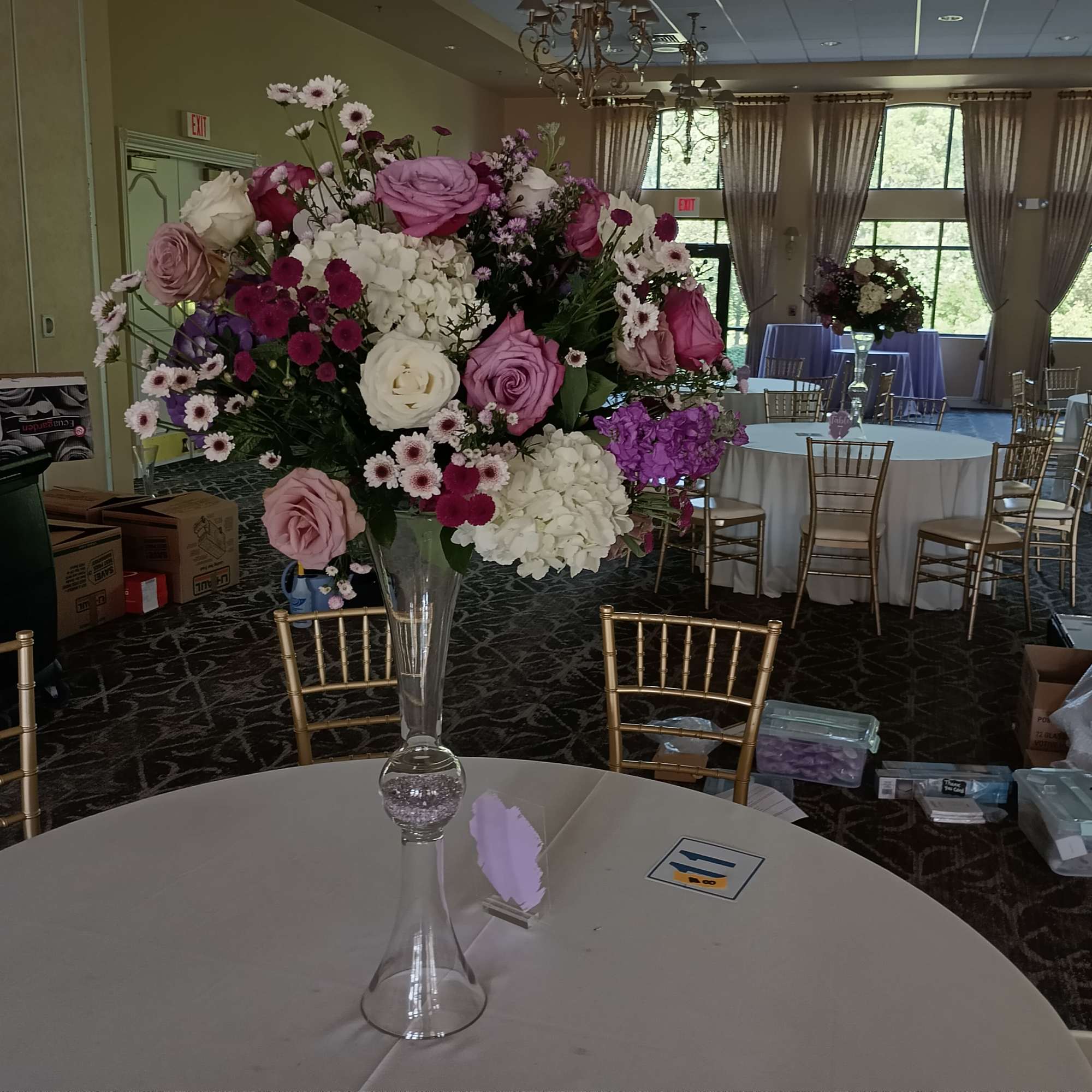 Beautiful shades of Lavander, purple, burgundy and white roses, hydrangeas, daisies and