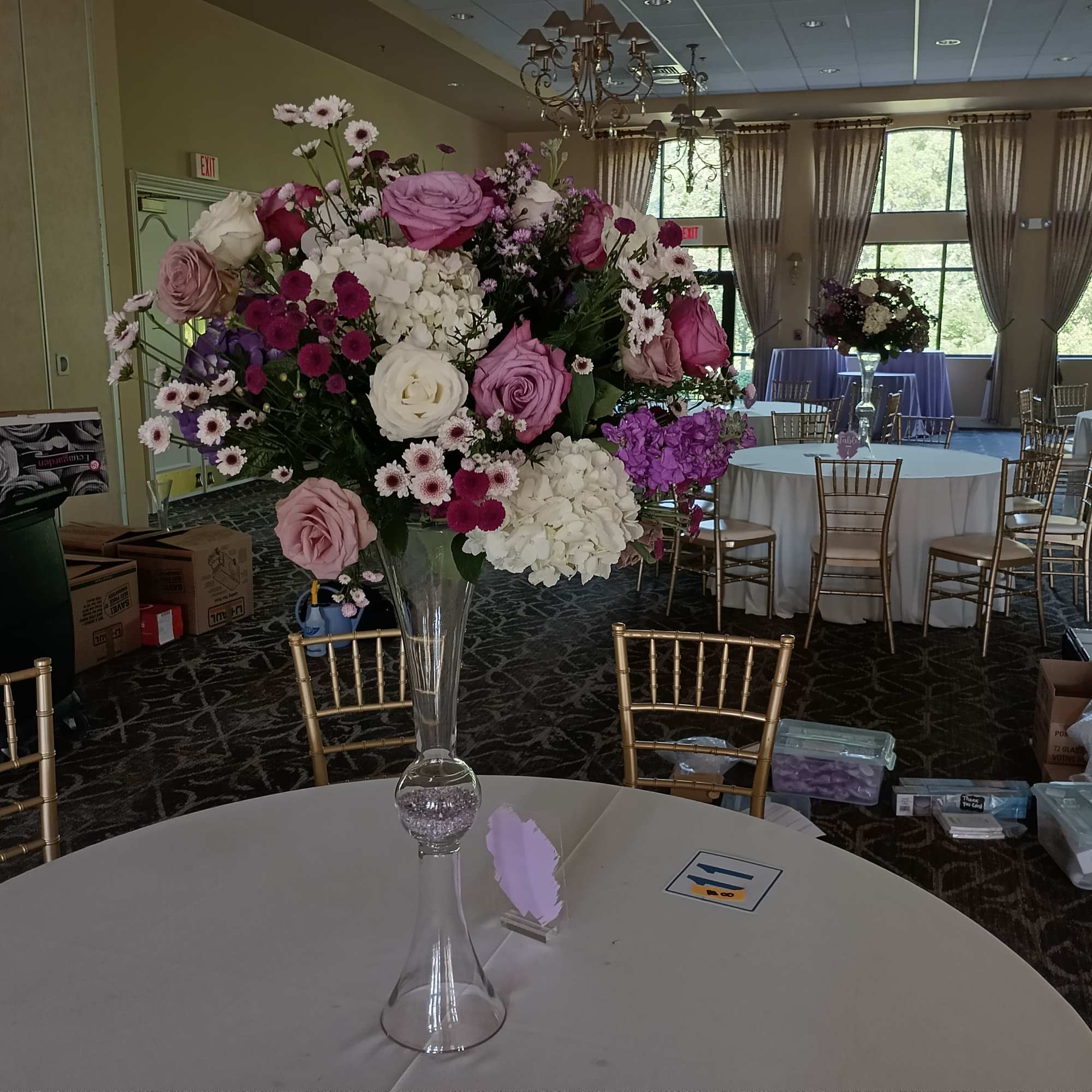 Beautiful shades of Lavander, purple, burgundy and white roses, hydrangeas, daisies and