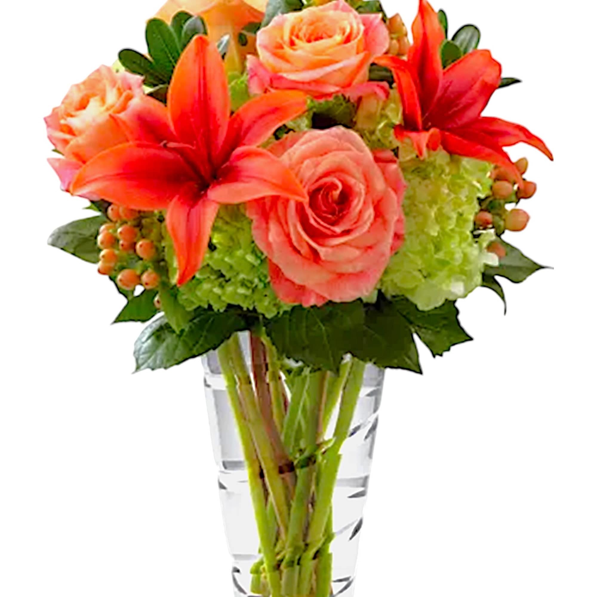 The Vera Wang Dawning Delight Arrangement is an elegant mixture of peach