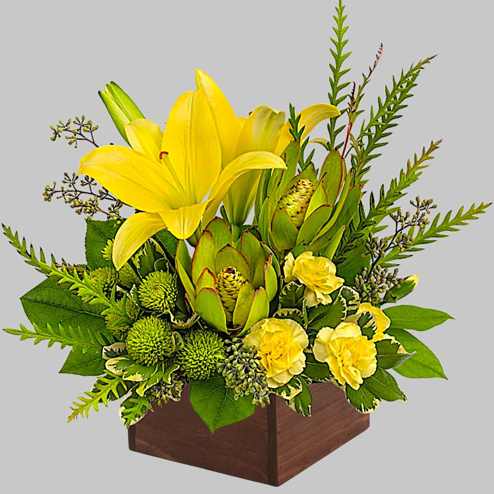 Let the sunshine in! This artistic arrangement of radiant lilies and fresh