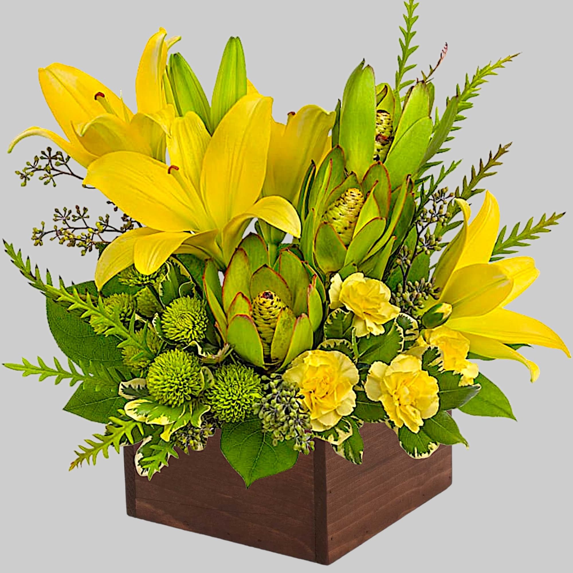 Let the sunshine in! This artistic arrangement of radiant lilies and fresh