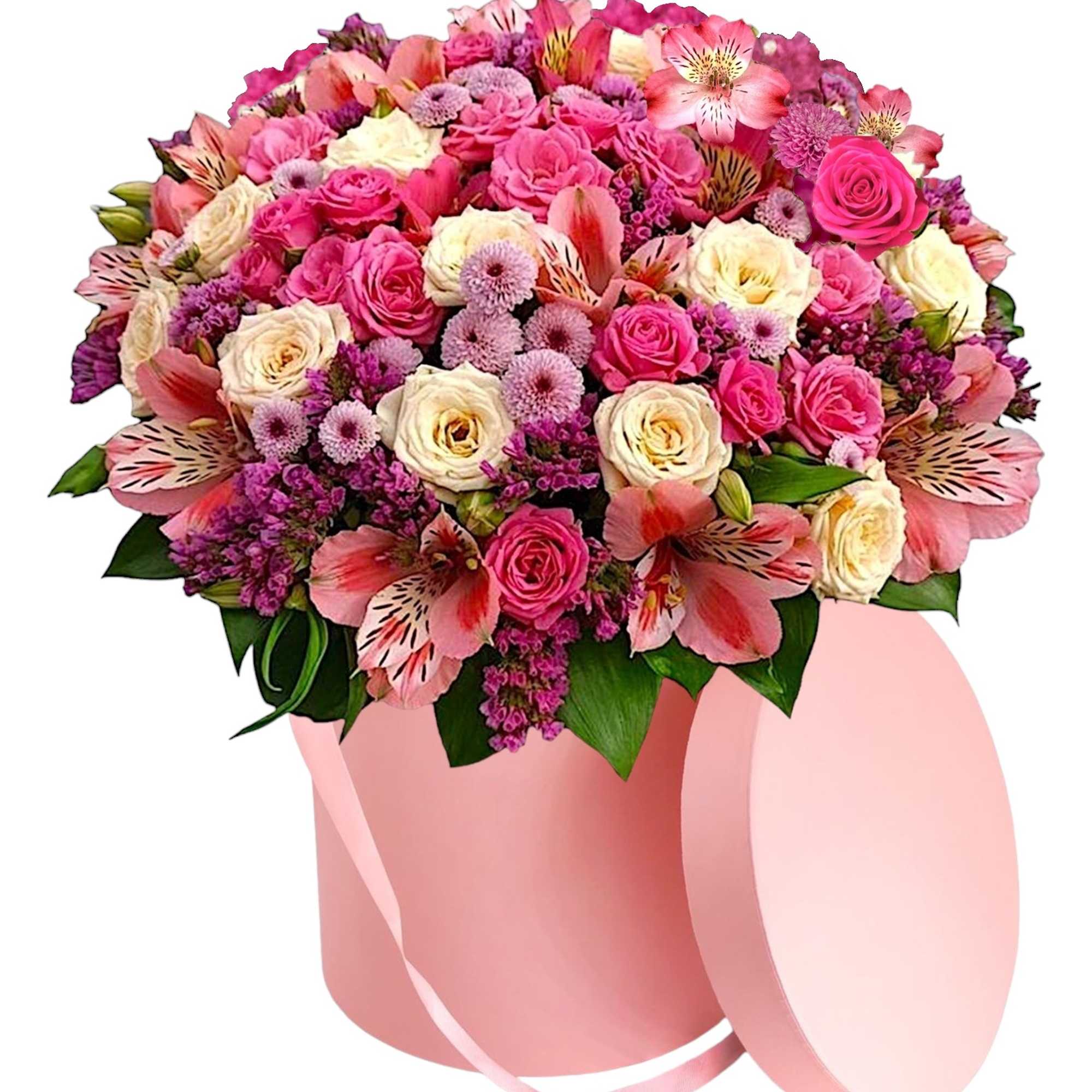 A modern petite flower arrangement in a cylinder box filled with a