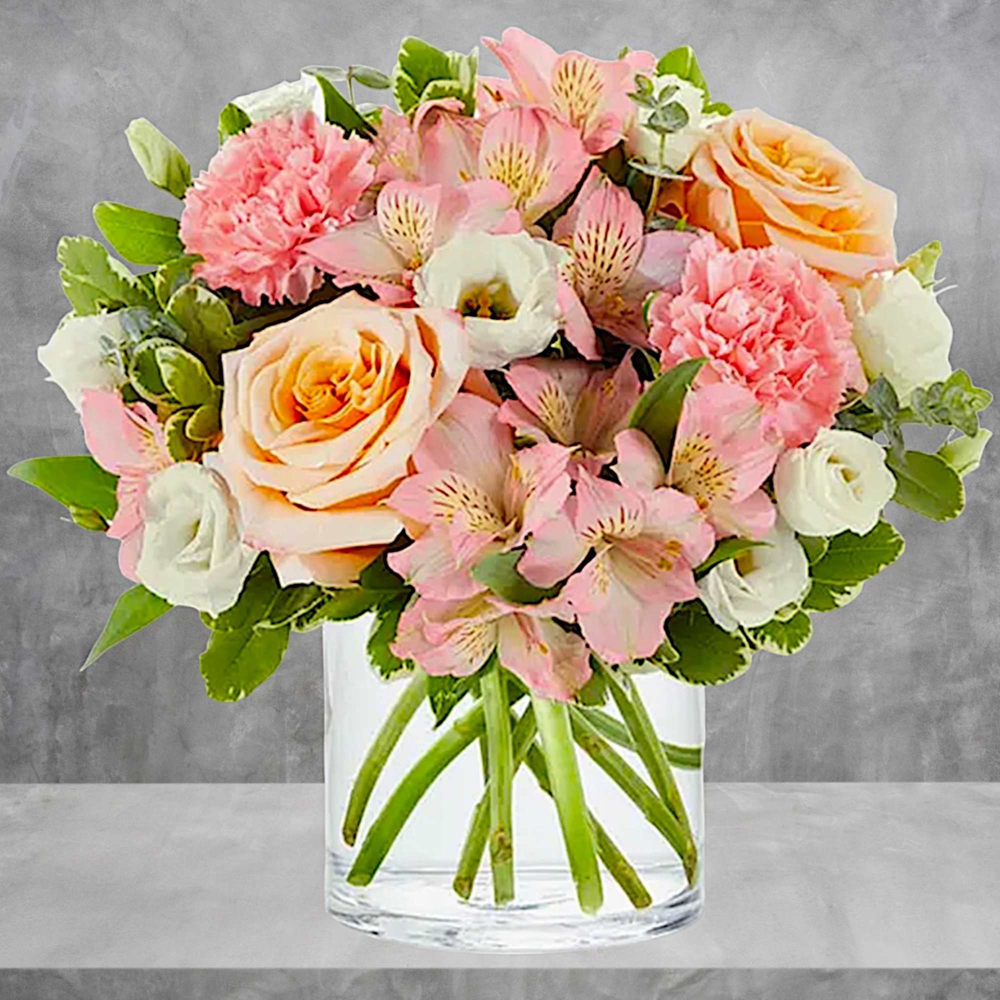 A soft and tender arrangement, perfect for expressing your gentle loving thoughts