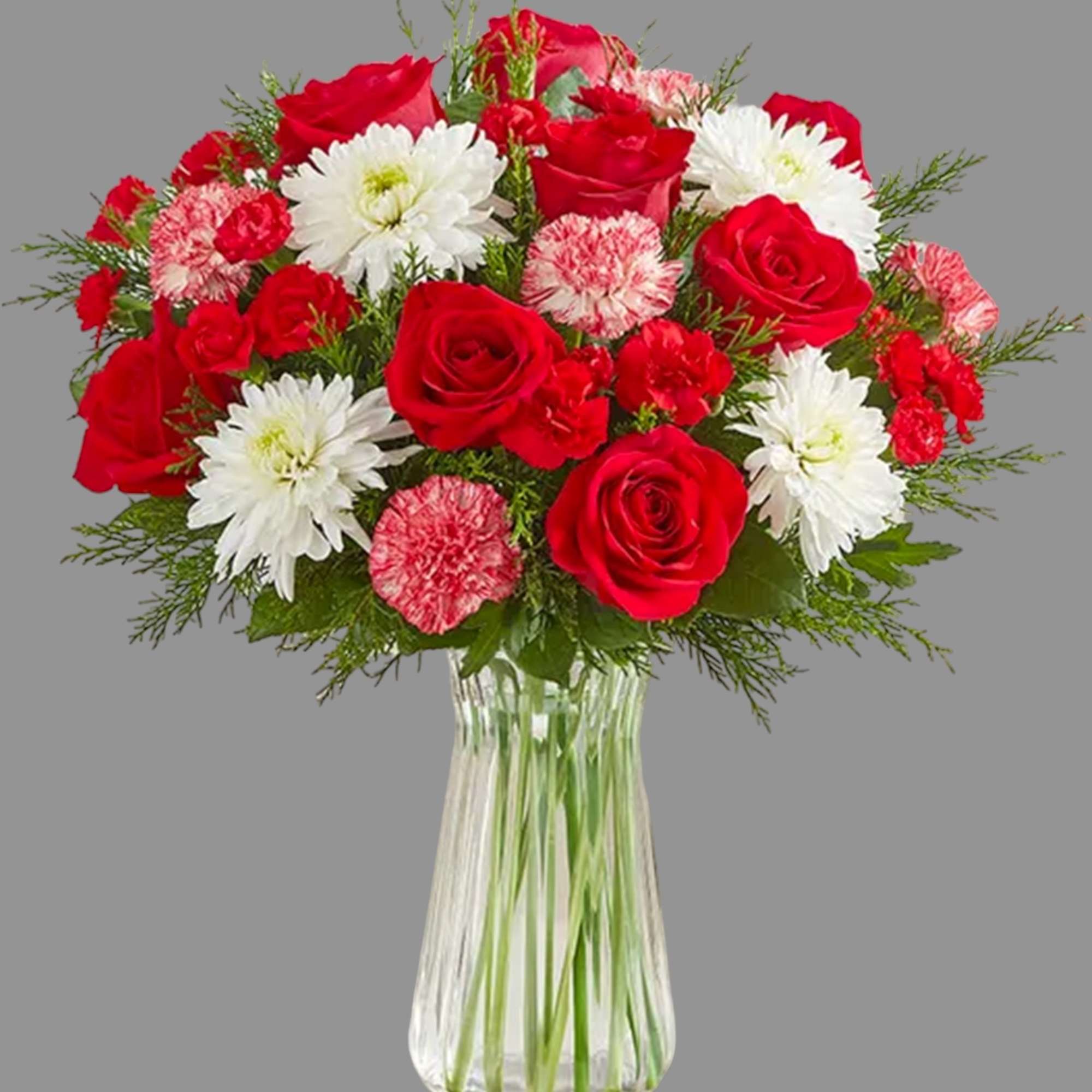 Give the gift of joy with our festive mix of blooms. This