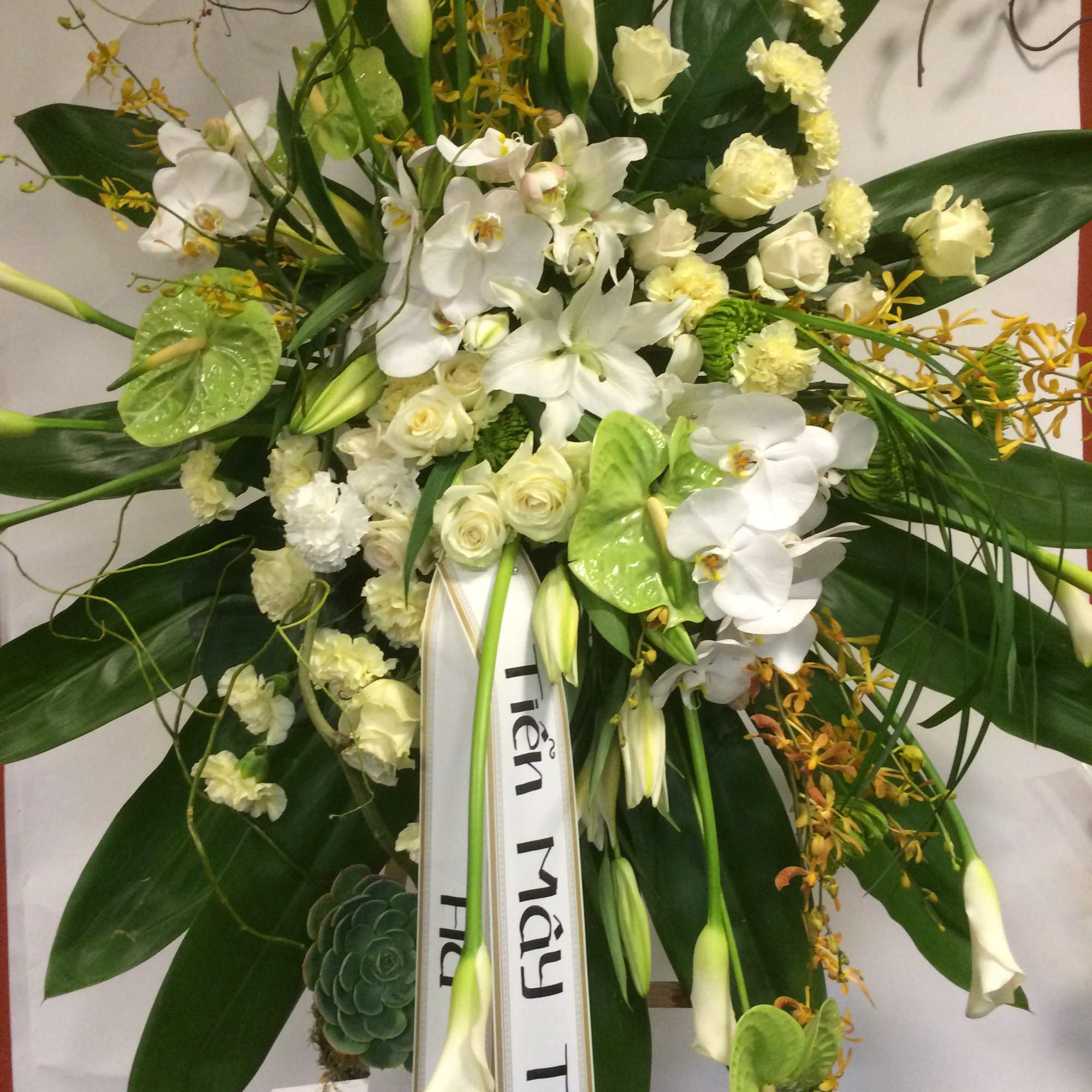 Sympathy arrangement.  Large standing spray to convey the sympathy message