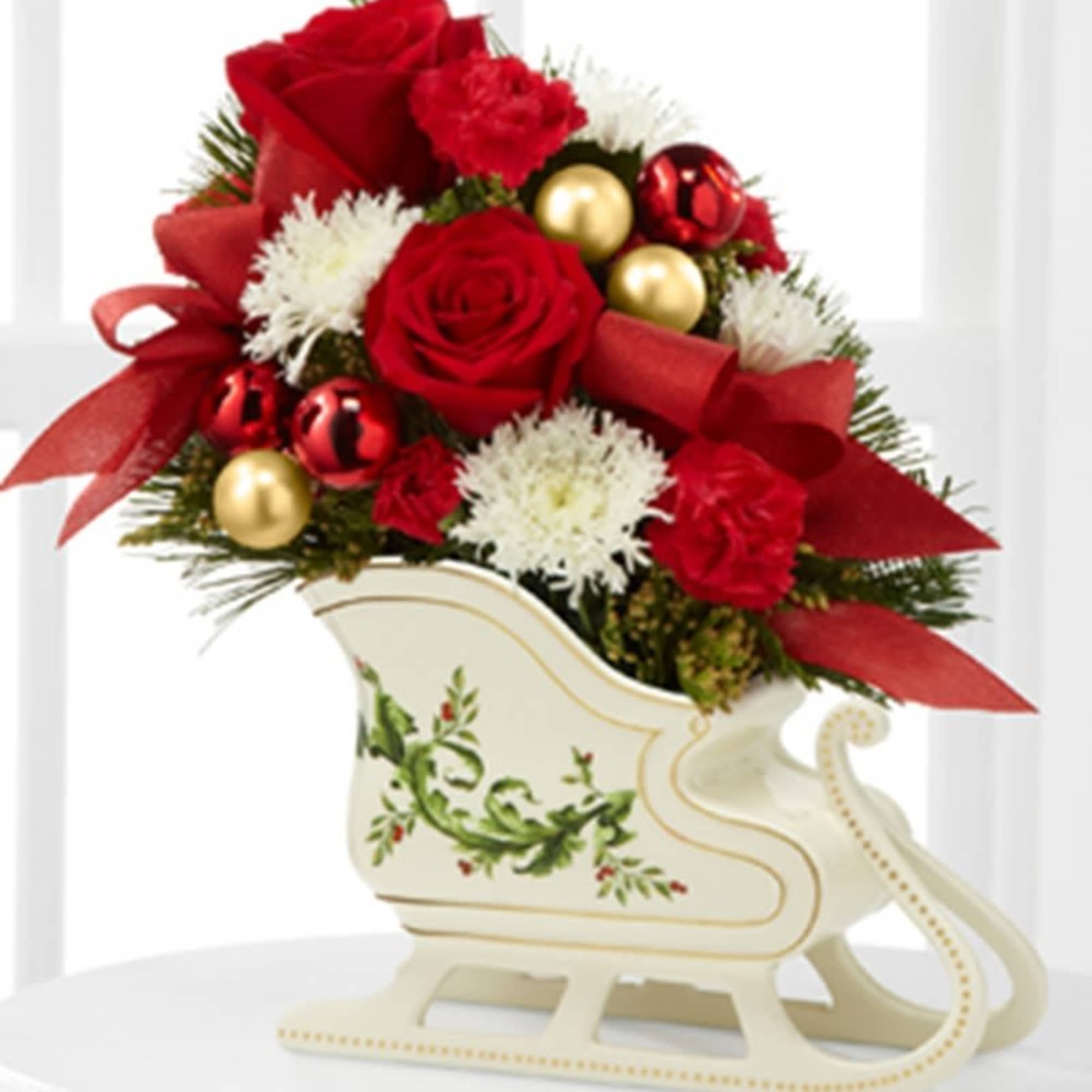 The Holiday Traditions Arrangement speaks to the beauty and magic of the