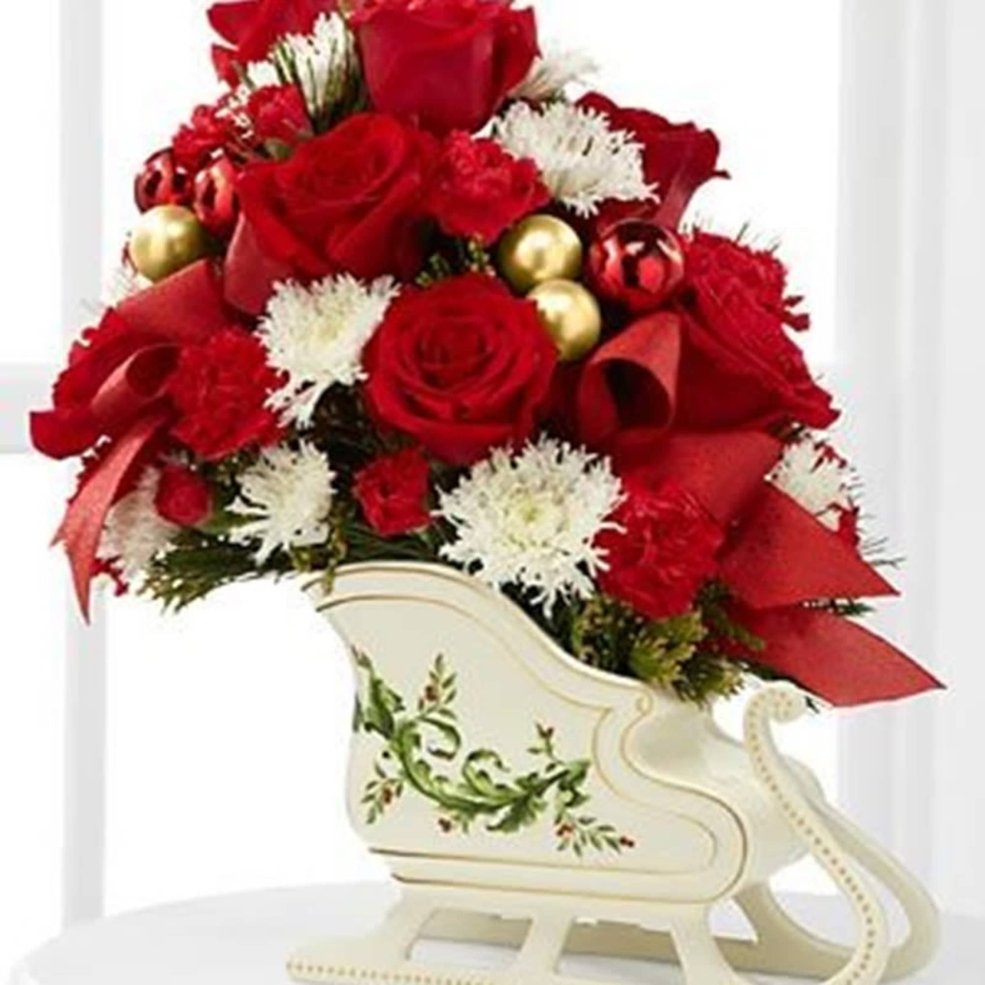 The Holiday Traditions Arrangement speaks to the beauty and magic of the