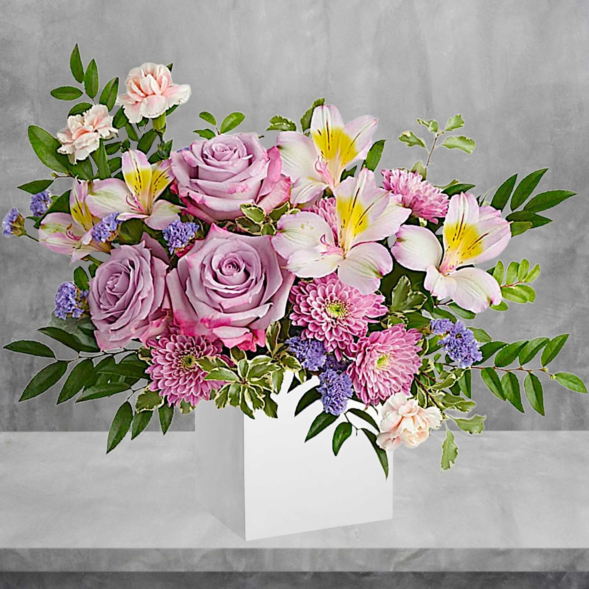 Make spring shimmer with this luxurious lavender arrangement, hand-delivered in a wooden
