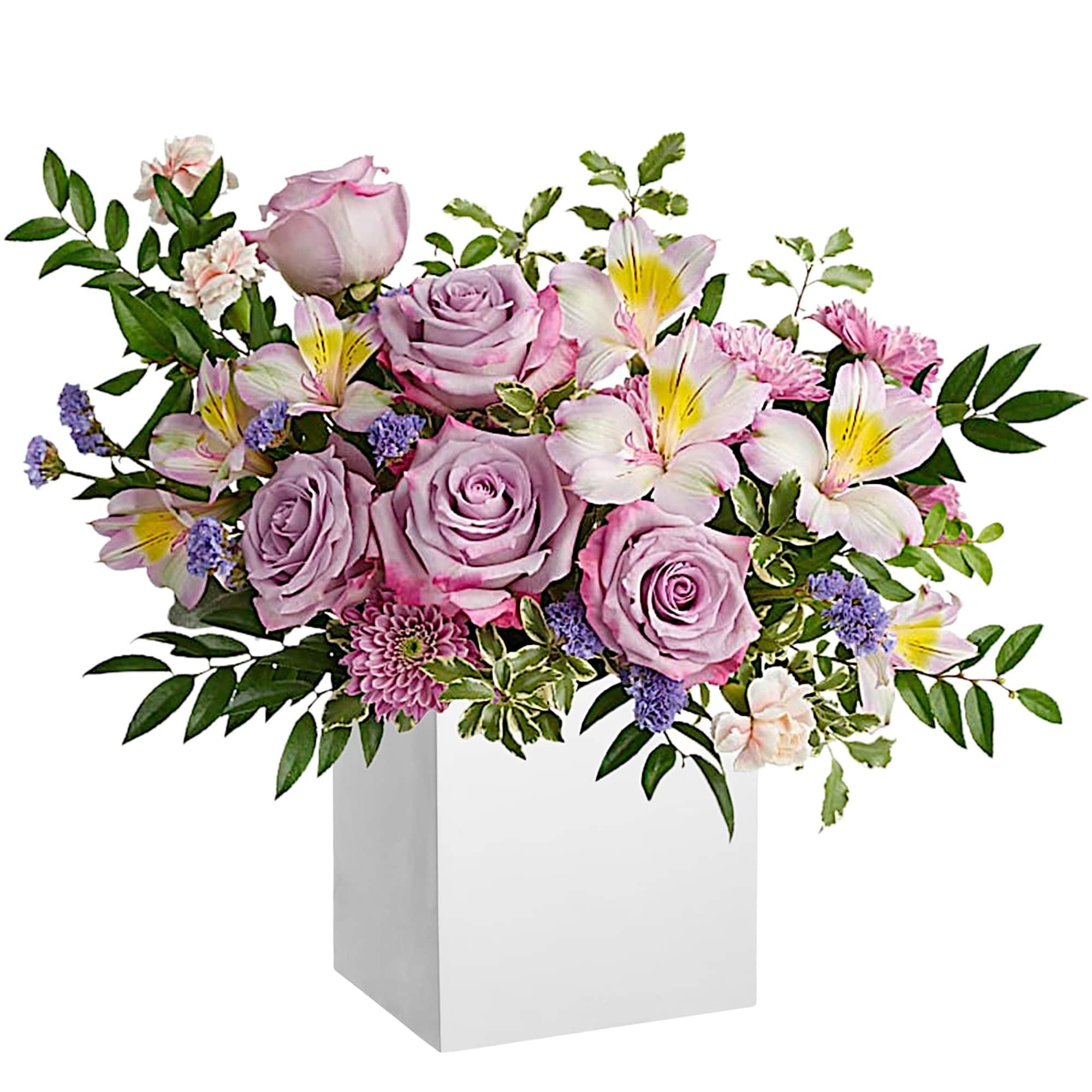 Make spring shimmer with this luxurious lavender arrangement, hand-delivered in a wooden